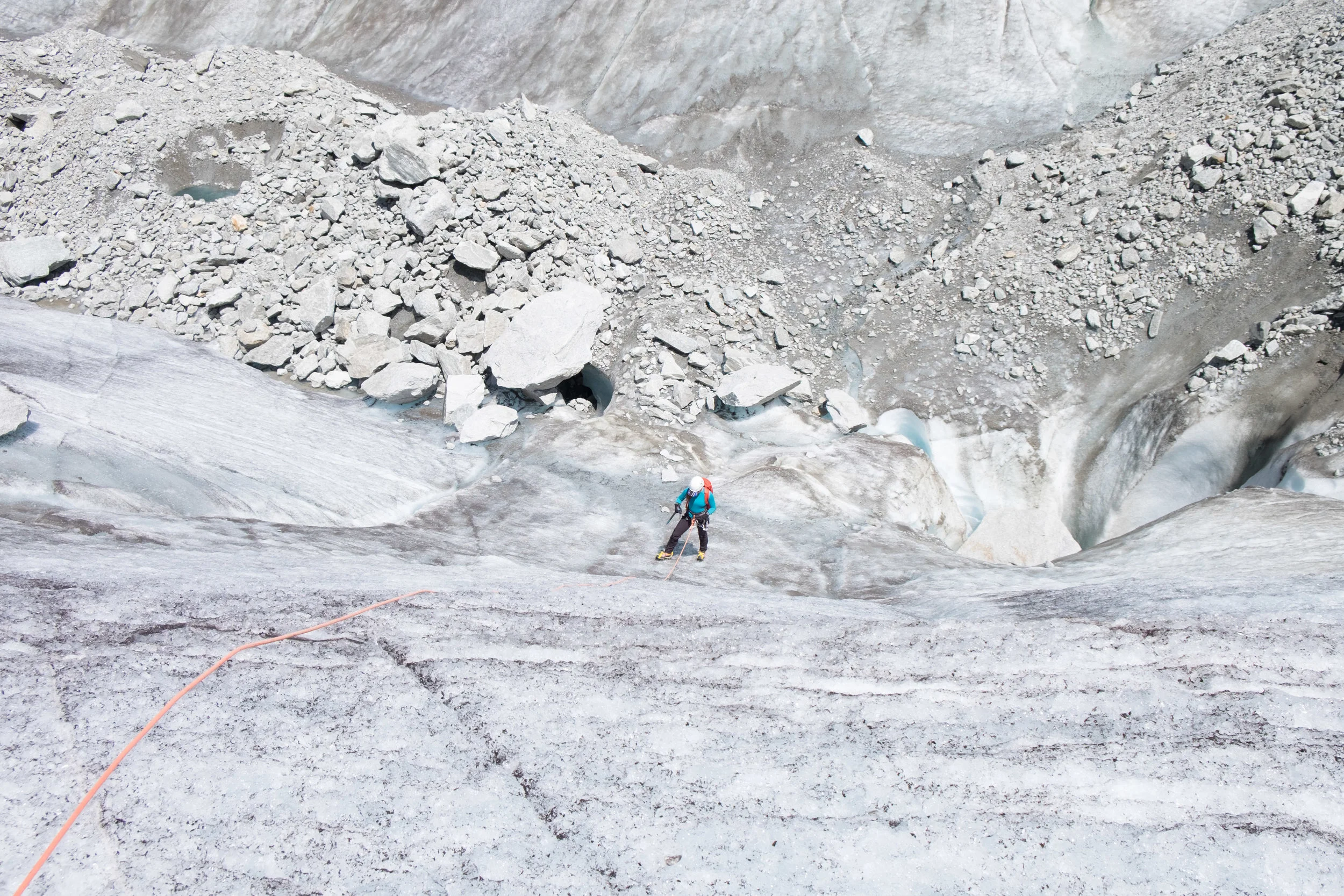 Sophie prepares to font point up a steep ice slope.
