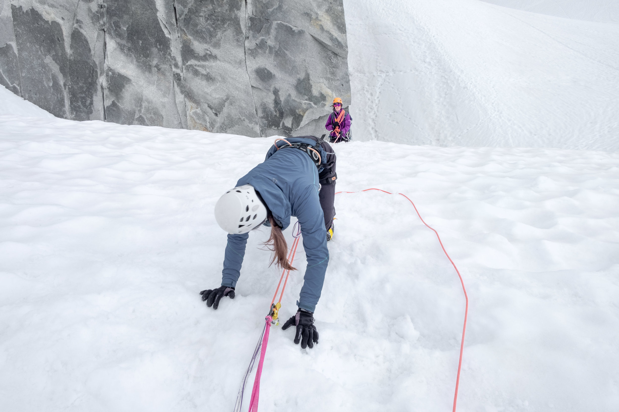 Sophie uses a Z hoist to rescue Rosa from a crevasse.