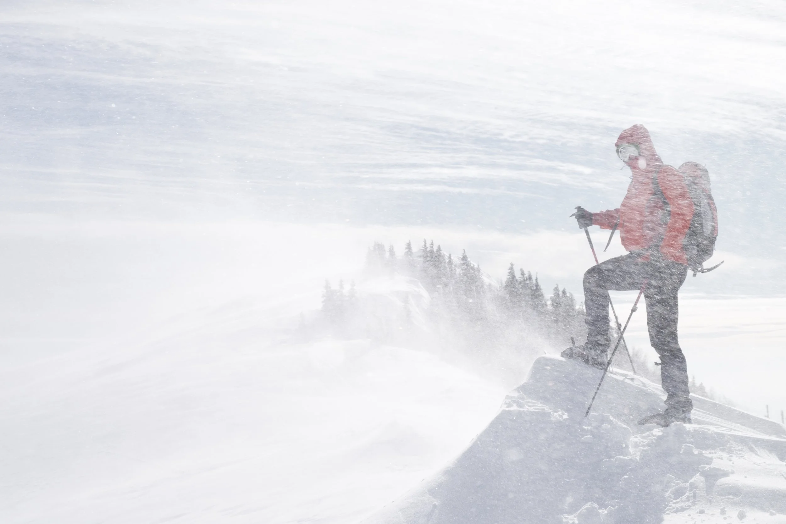 Zlatko snowshoeing across a blustery Velika Planina.