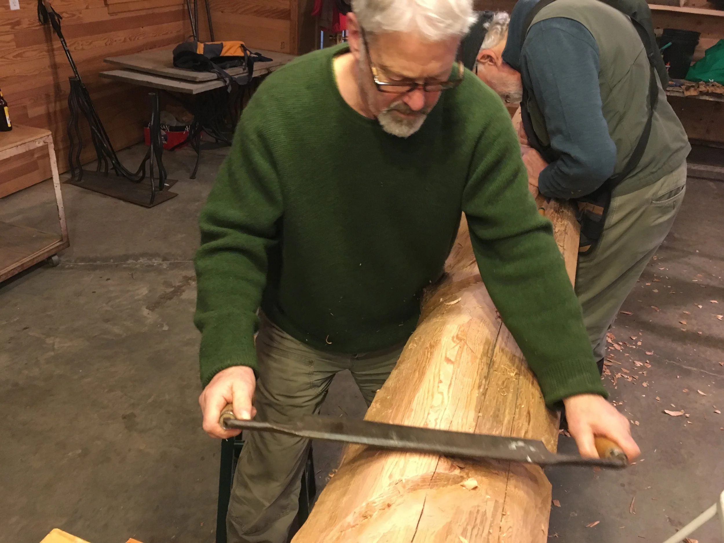 Kim Hoelting using a draw knife