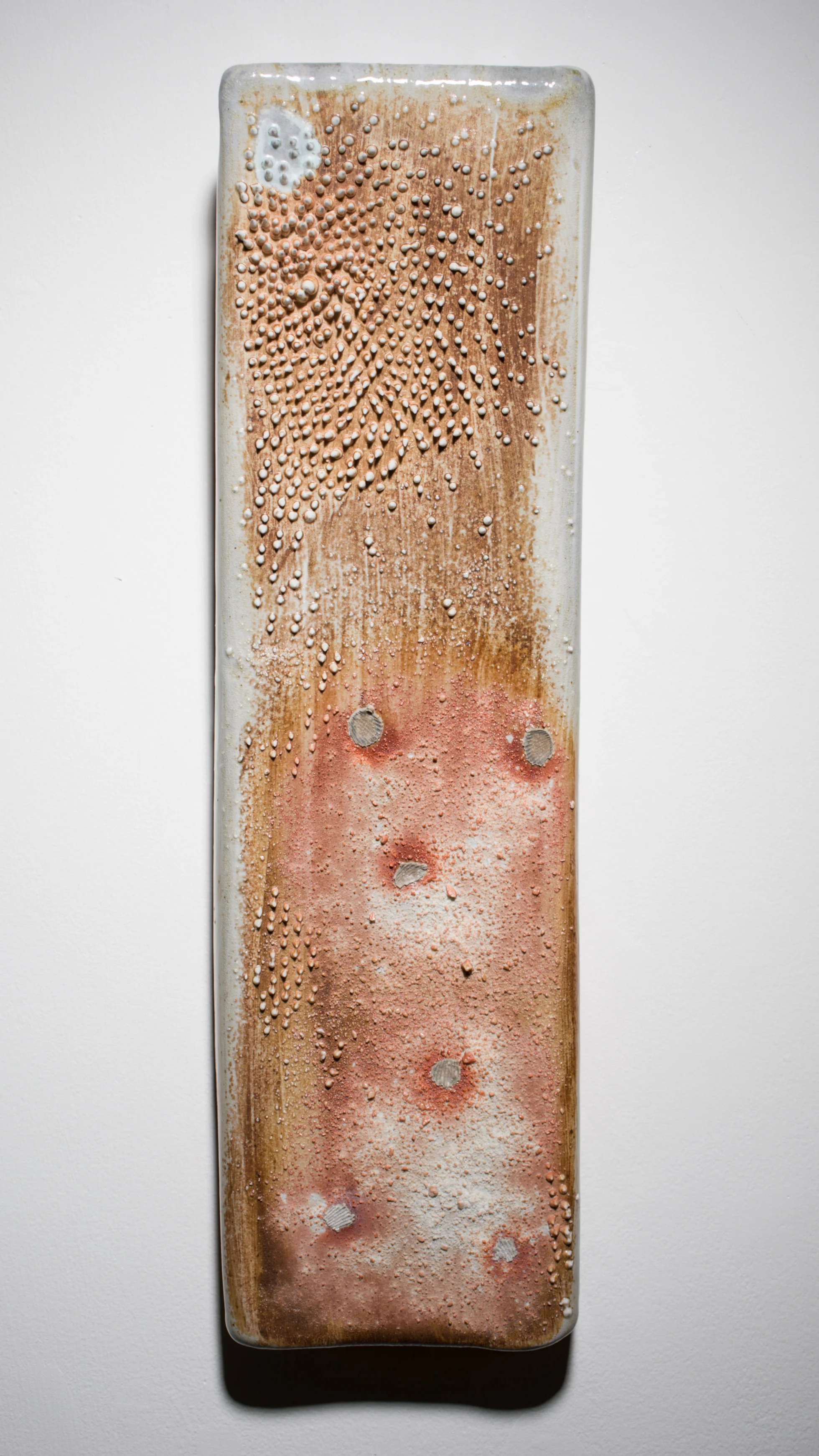 “Narrow Wall Pillow” stoneware, wood-fired 24” x 3” x 4”