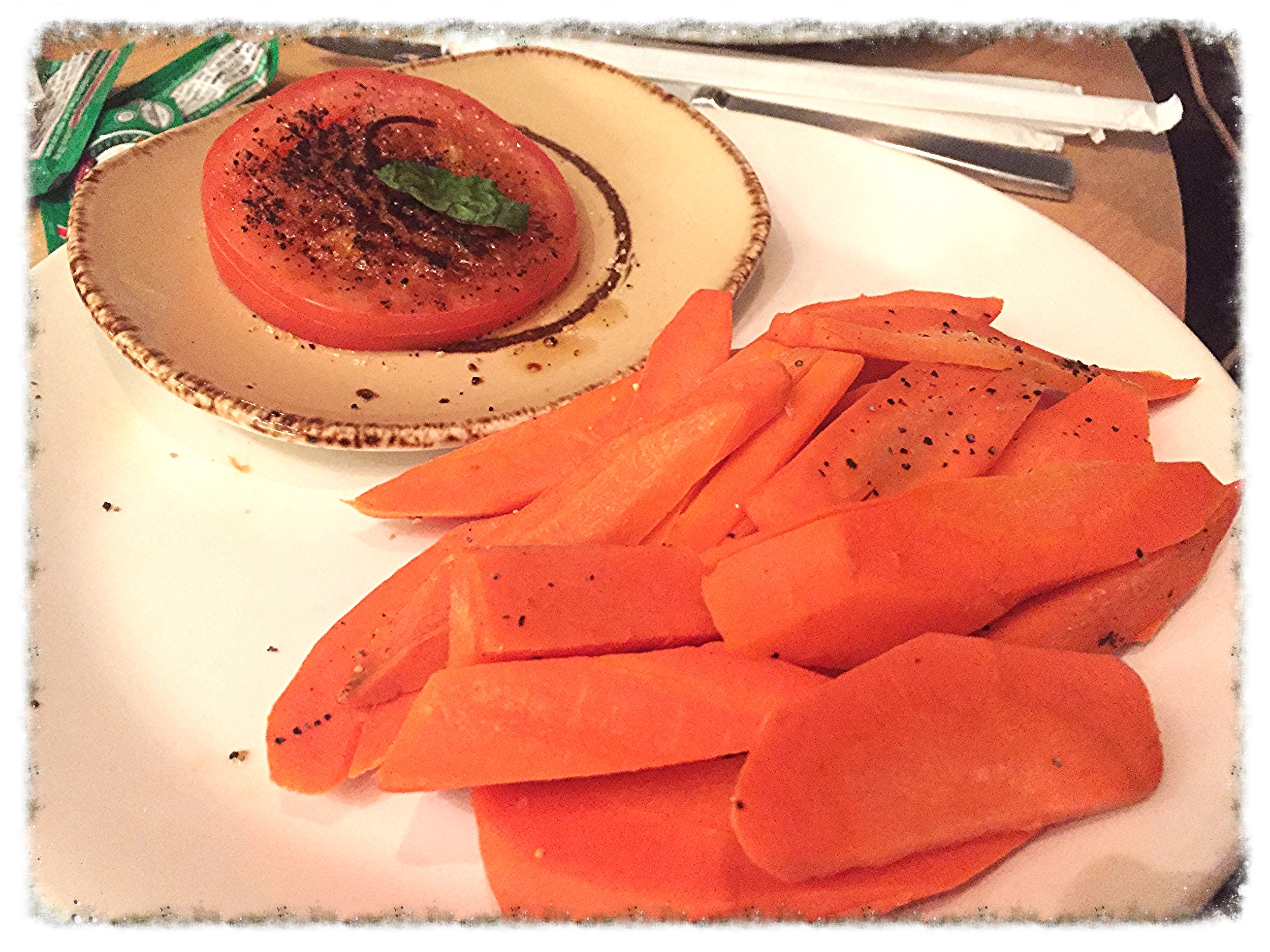 Tomato with olive oil, cracked pepper and salt and carrots from Bacchanal Buffet