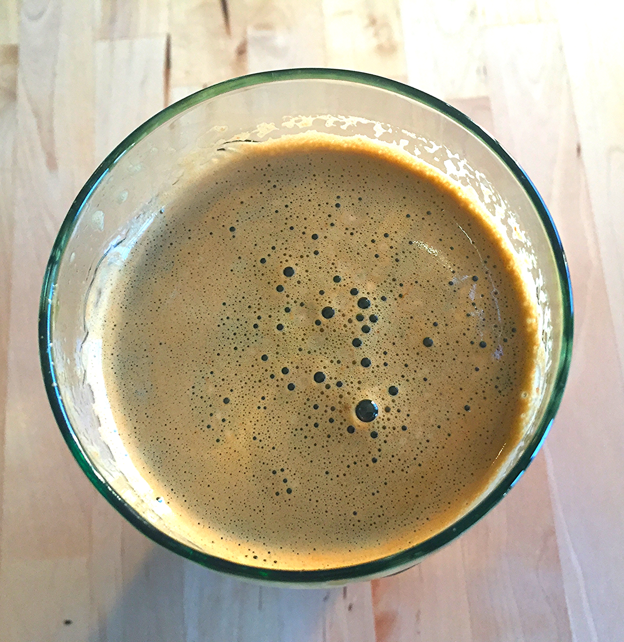 Juice made with green chard, kale, carrots, ginger and parsley