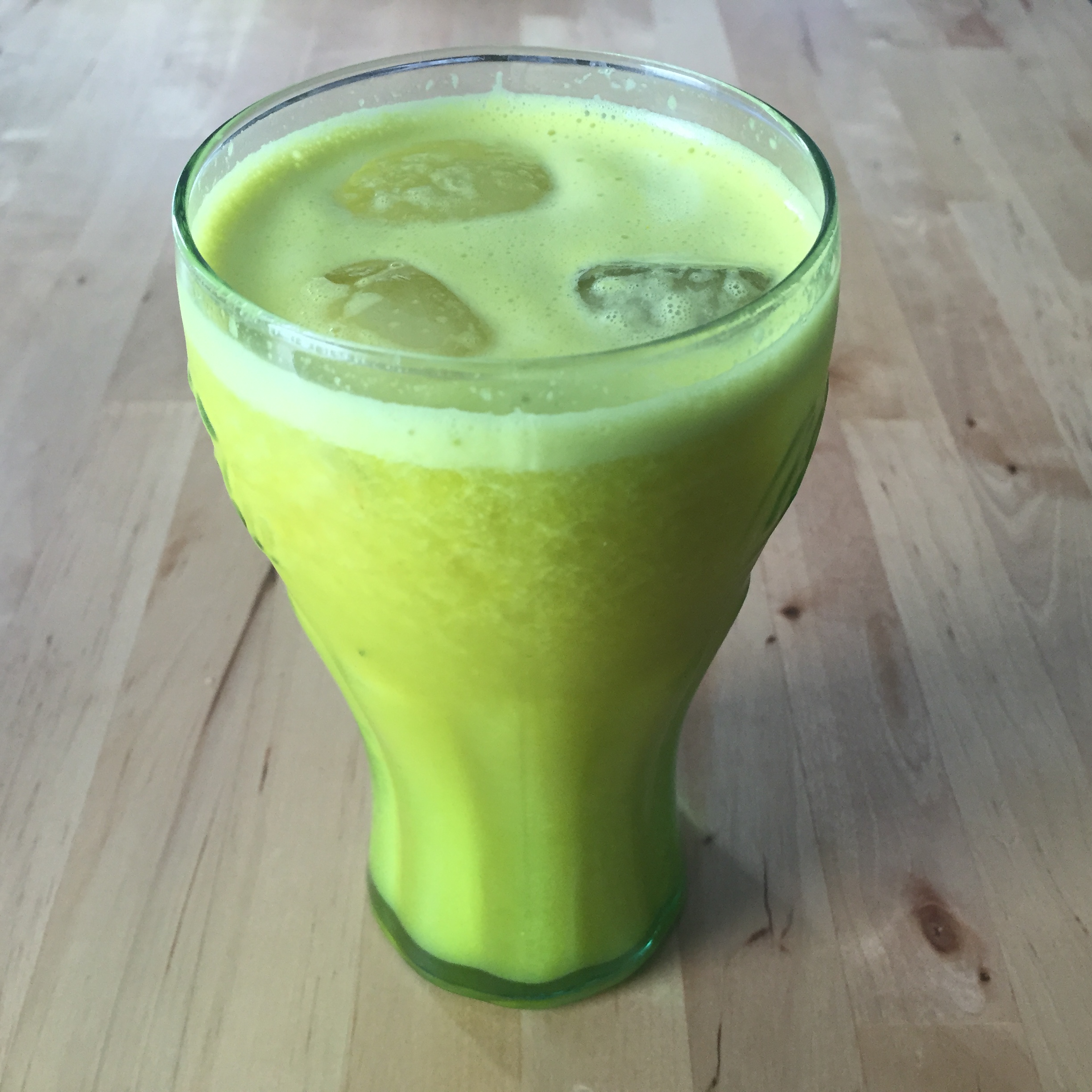 Pineapple, cucumber, lemon, ginger and turmeric juice