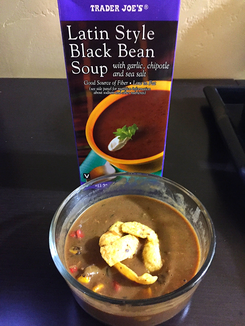 Black bean soup with meatless grounds, roasted corn and fajita veggies