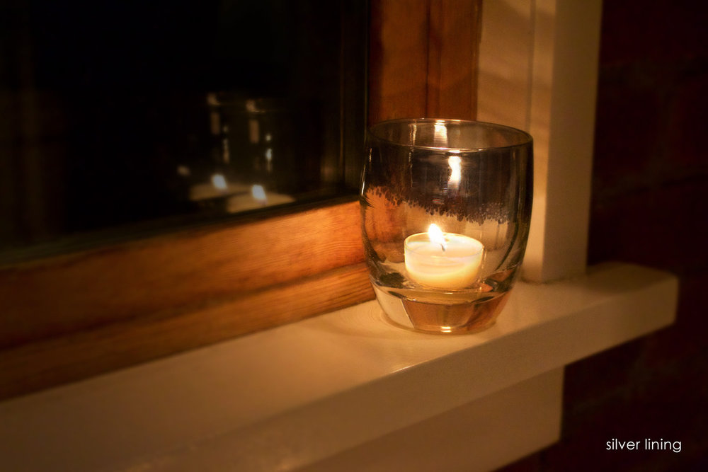 Sustainable, hand-blown 'silver lining' votive by glassbaby