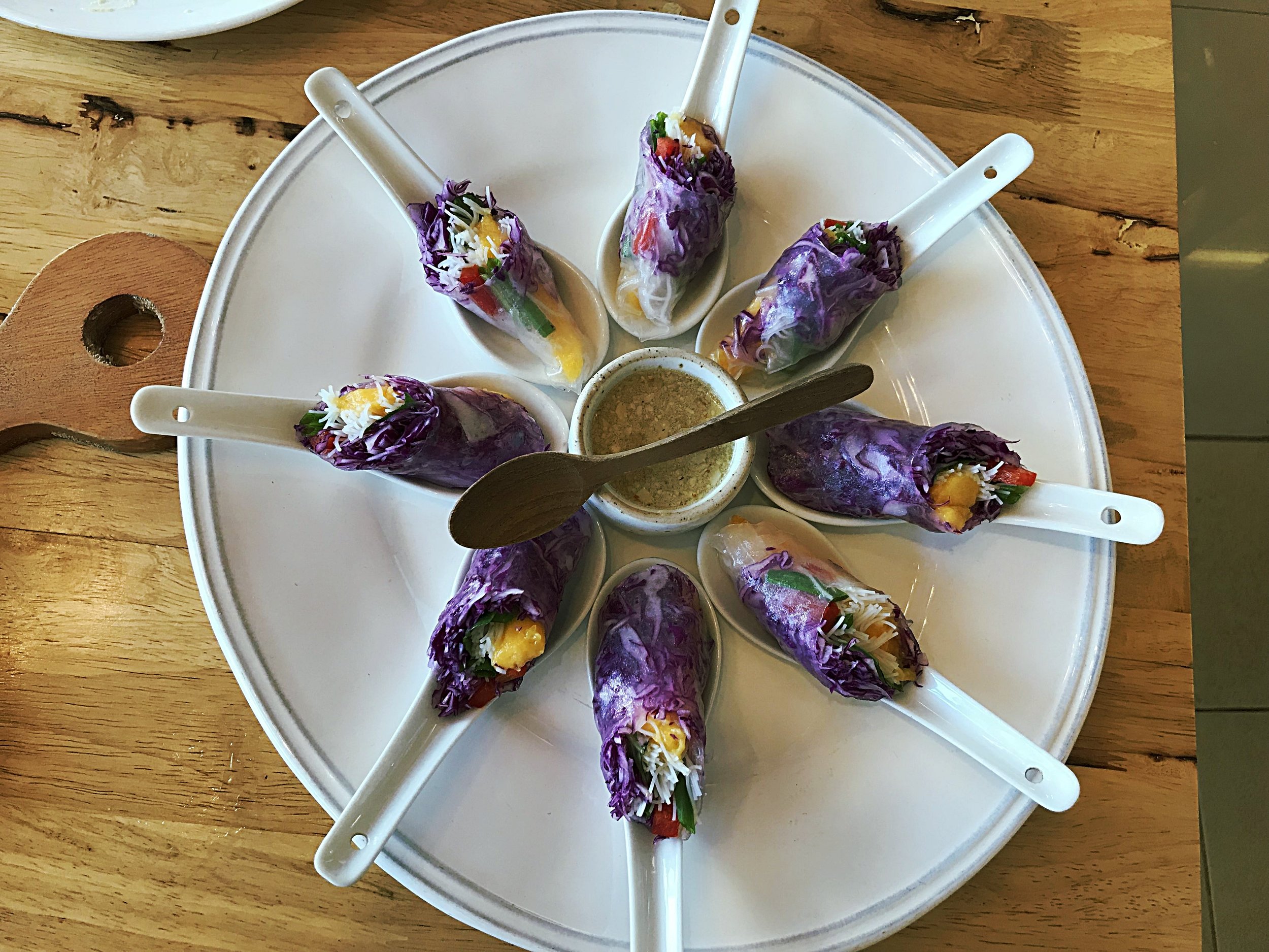 Fresh mango spring rolls with almond coconut sauce