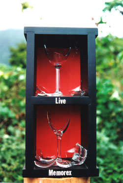 IS IT LIVE, OR IS IT MEMOREX? Pine, glass, and found wine glasses.