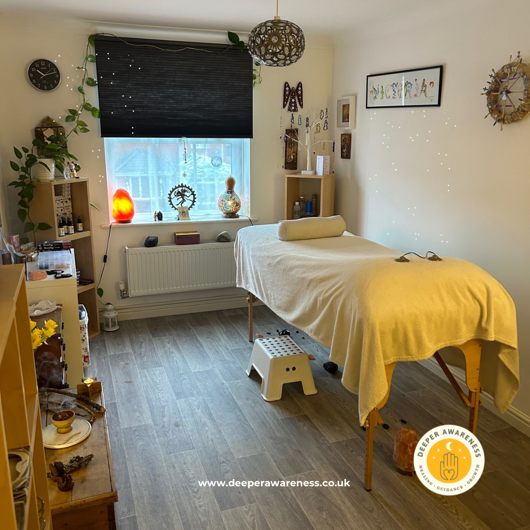 Reiki healing room with prepared treatment bed for energy healing