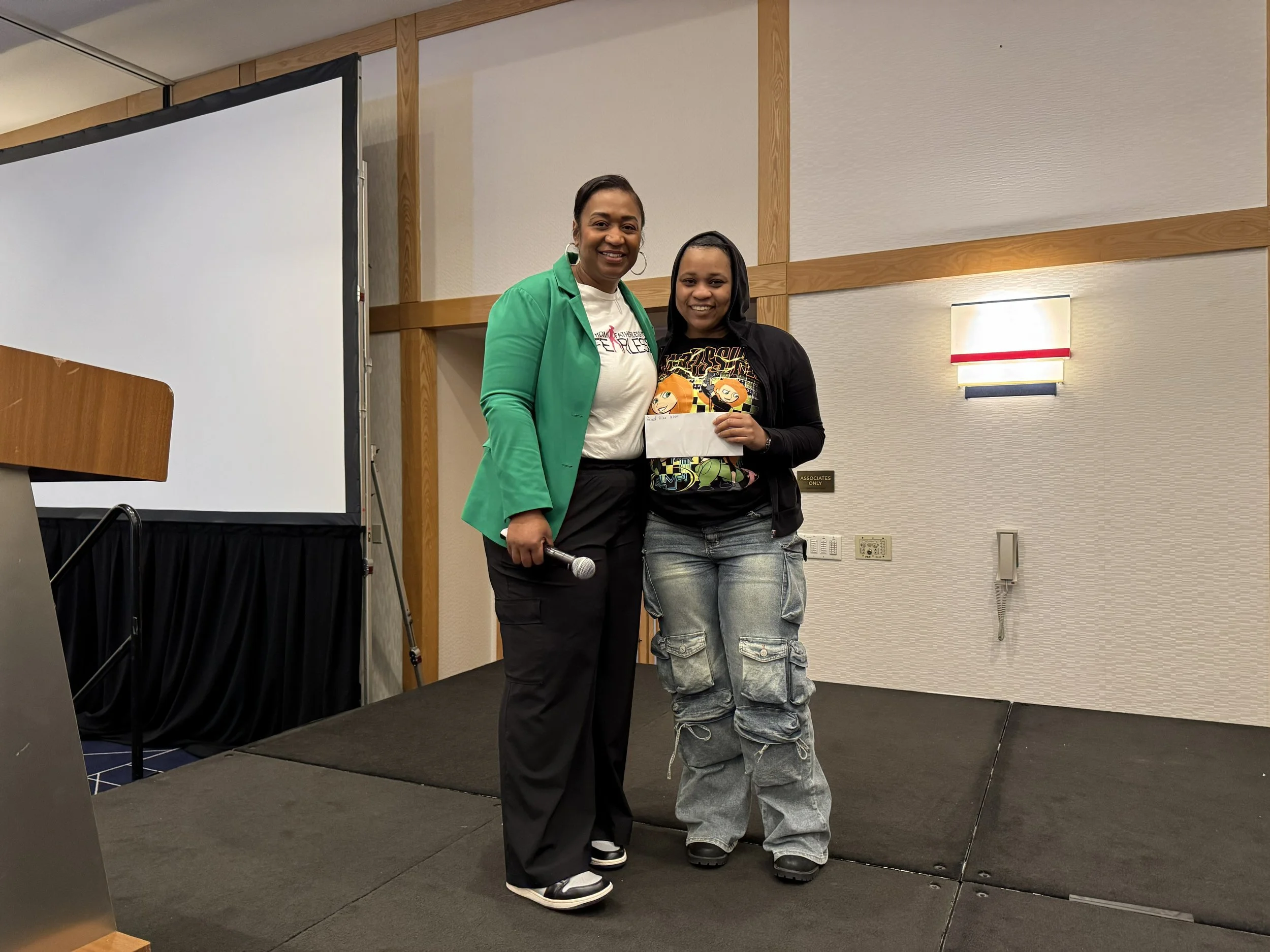 A winning teen participant at the 2026 What's the Scoop? event.