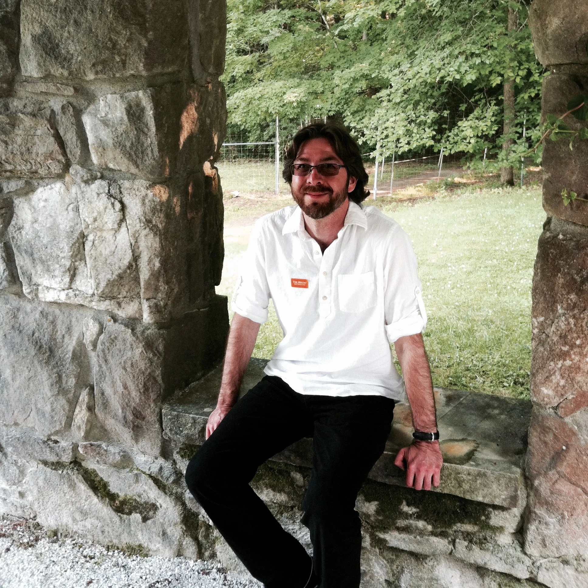 A picture Alia took of me sitting in the stone wall at the edge of the gardens. — N.M-Y. '15