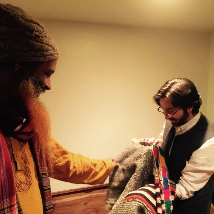 Ibrahim Baba and I in Rabbi Zalman Schachter-Shalomi's prayer room, looking at the very first "Rainbow Tallit." Photo by Issa Farajajé, 2015.