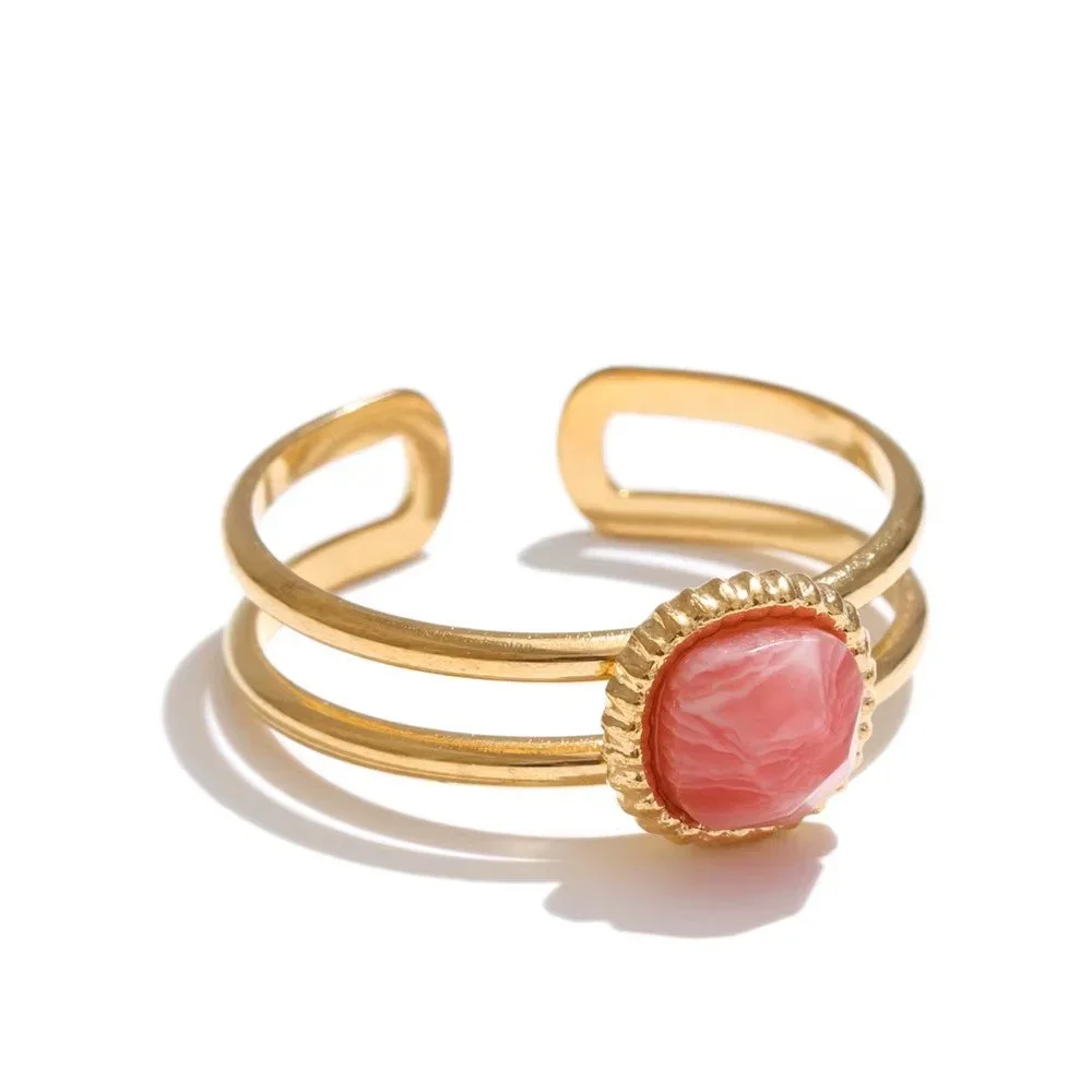 Chloe Adjustable Gold Ring featuring a pink gemstone centerpiece with a polished gold finish and elegant adjustable design for a feminine everyday jewelry look.