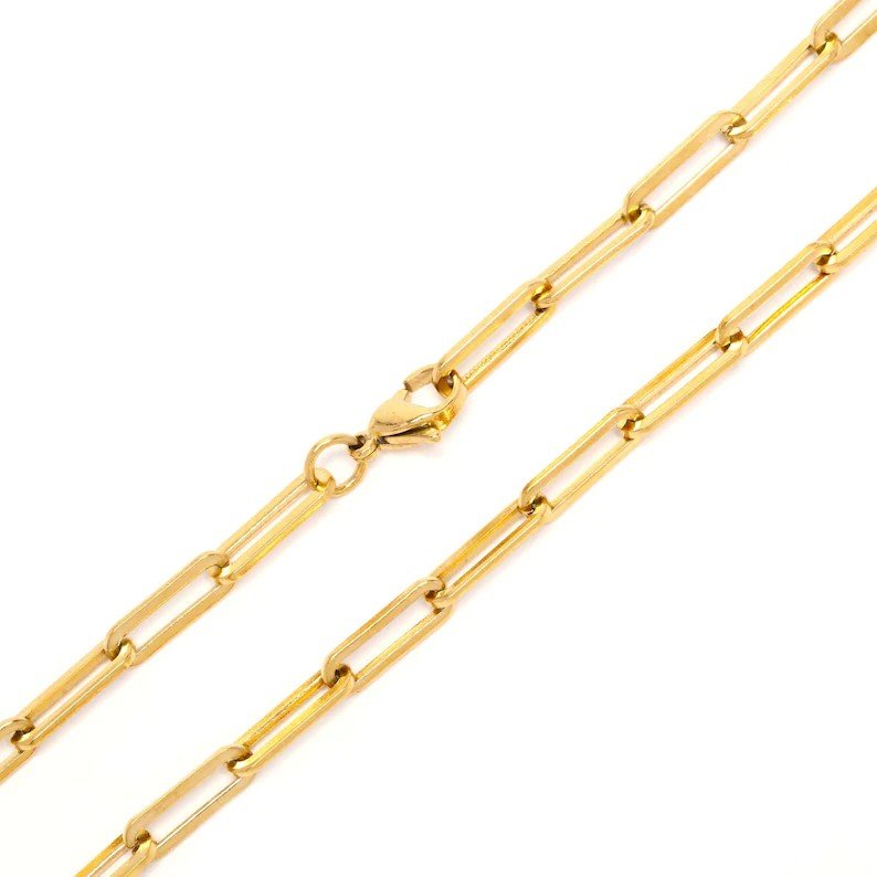 Gold chain necklace with an adjustable clasp closure.