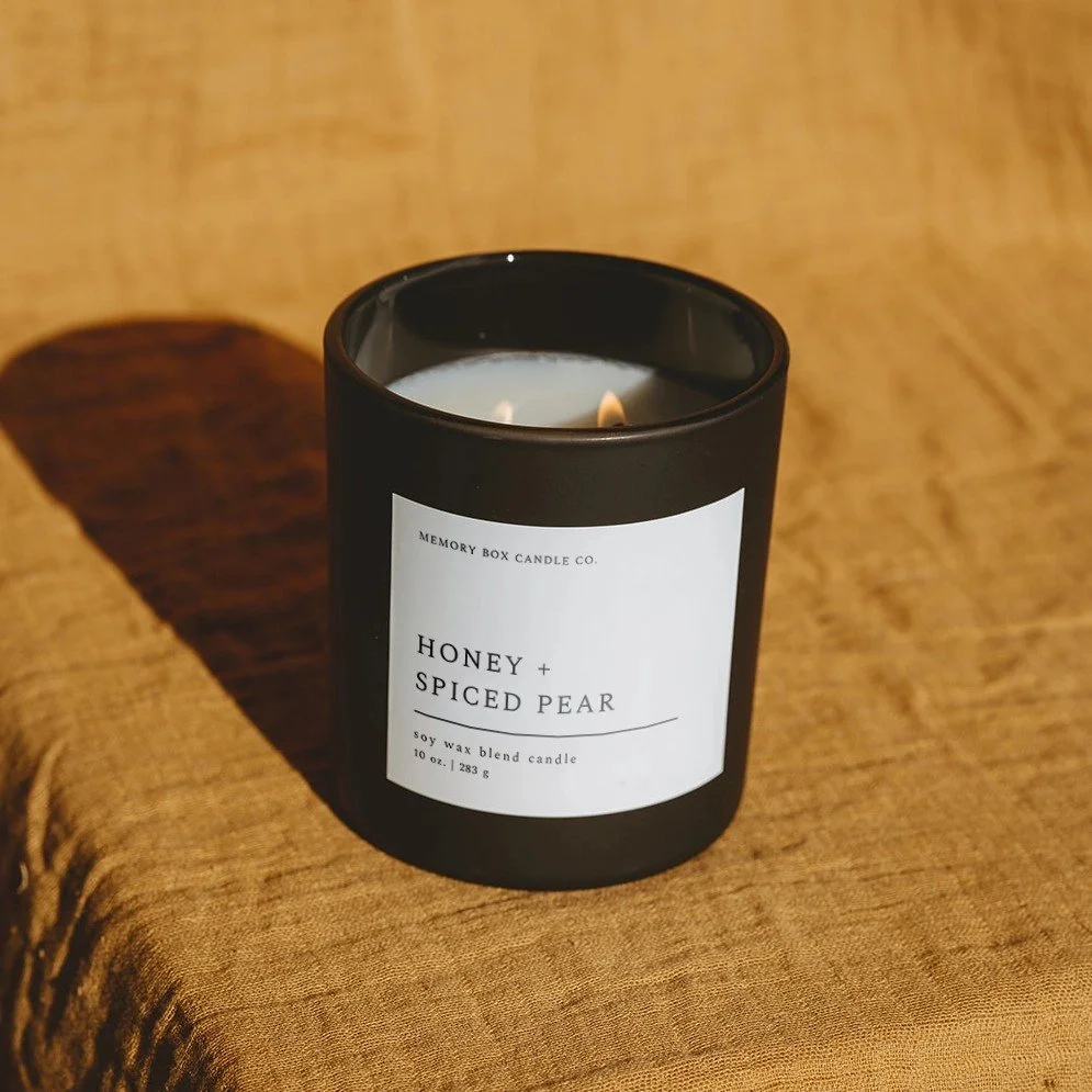 A spiced pear and honey scented candle for fall and winter.