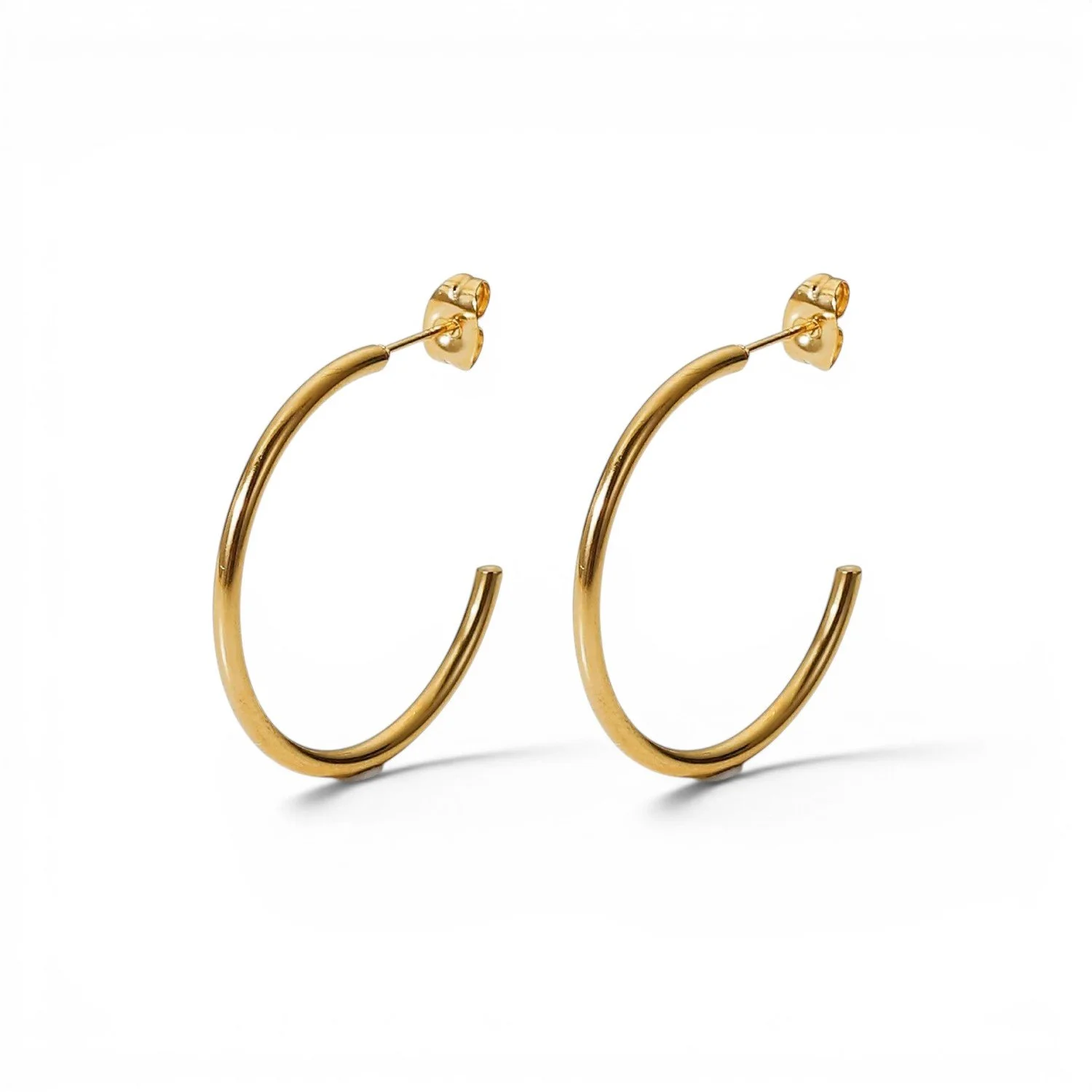 Gold classic hoop earrings for women.
