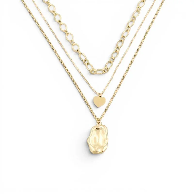 Triple Layered Gold Charm Necklace featuring three delicate gold chains with mixed charms and a polished finish for an elegant layered jewelry look.