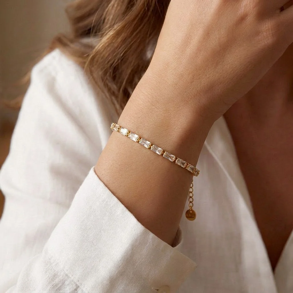 Gold baguette CZ bracelet styled for everyday and special occasions.