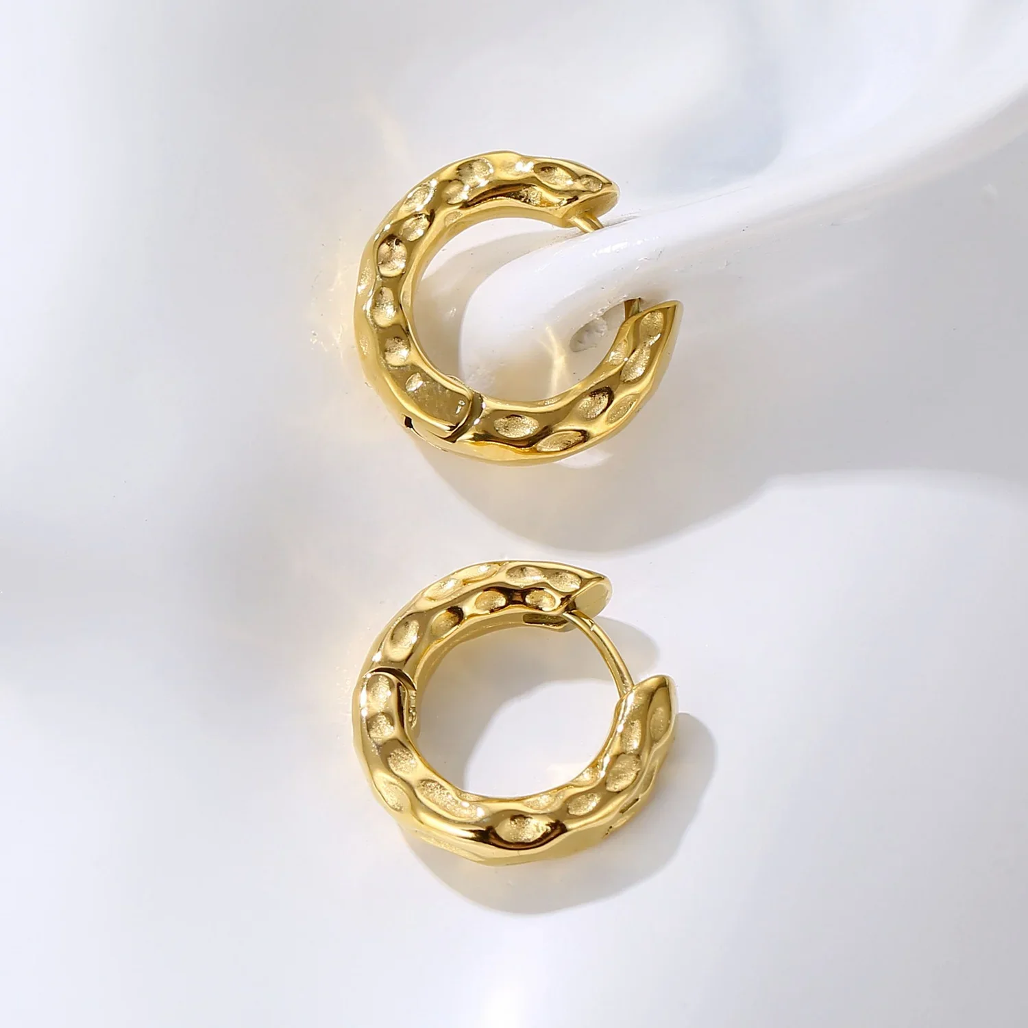 Hammered Gold Hoop Earrings for women, a modern textured jewelry piece and thoughtful gift perfect for birthdays, anniversaries, and celebrations.