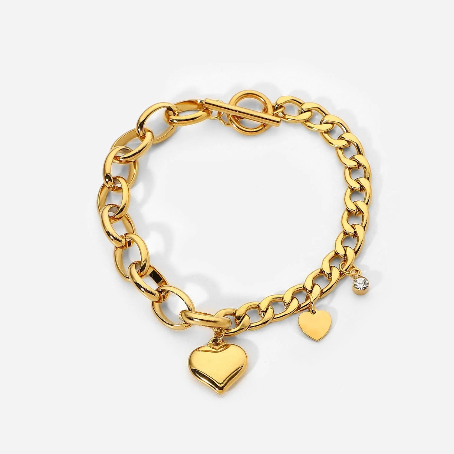 Amour gold chain link bracelet with toggle closure.