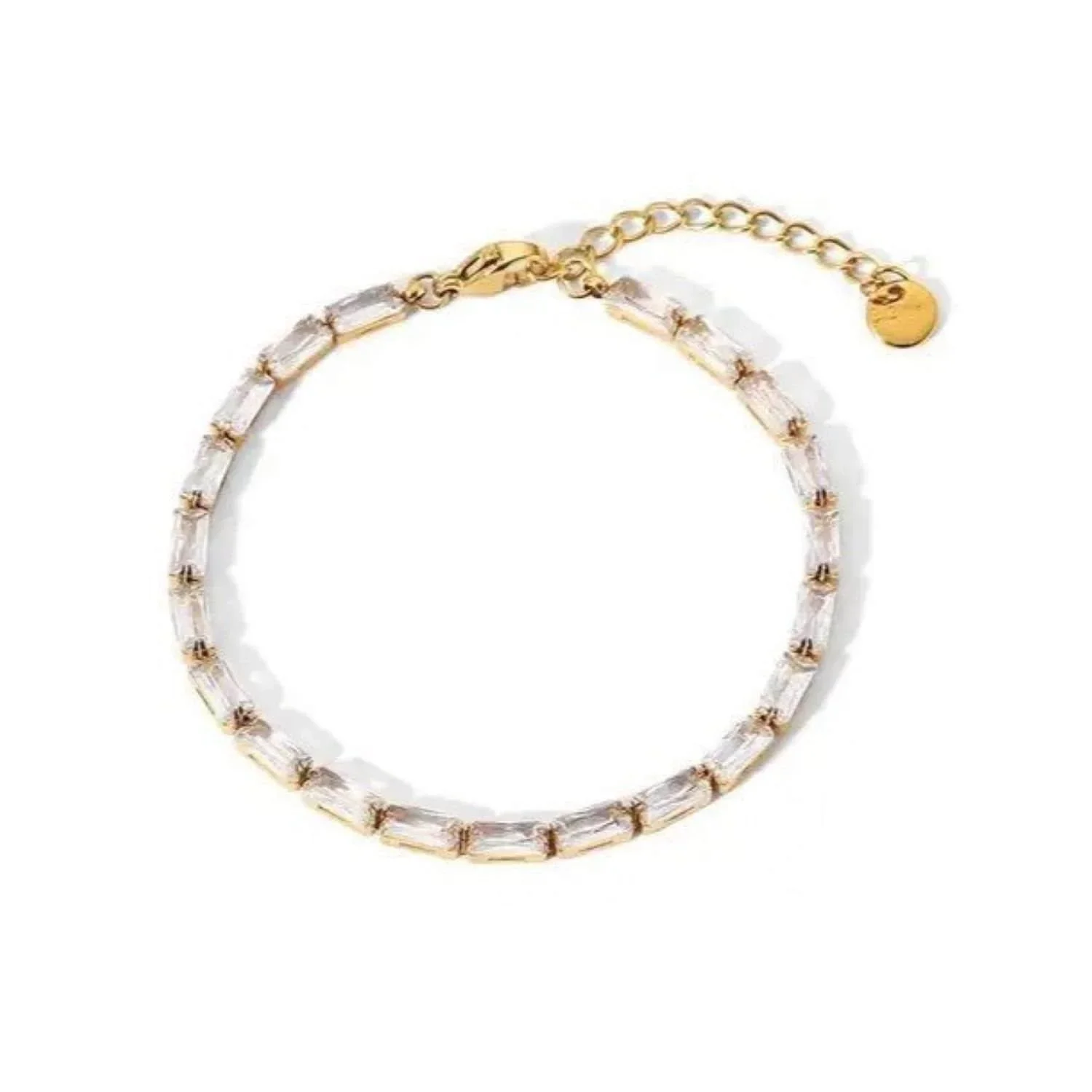 Soulmate Baguette CZ Tennis Bracelet featuring elegant baguette-cut cubic zirconia stones set in a polished gold design for a timeless luxury look.