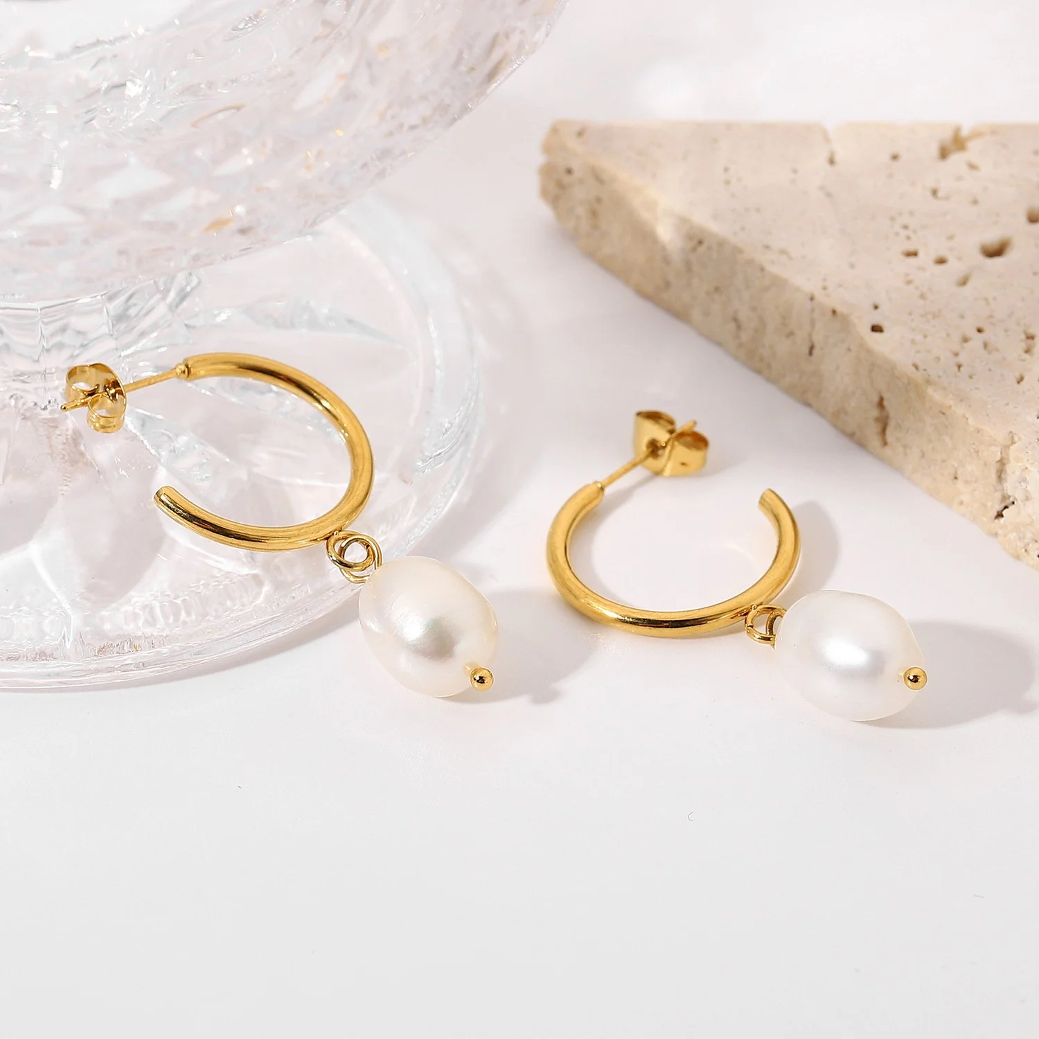 18k gold plated pearl hoop earrings that are fashionable and understated.