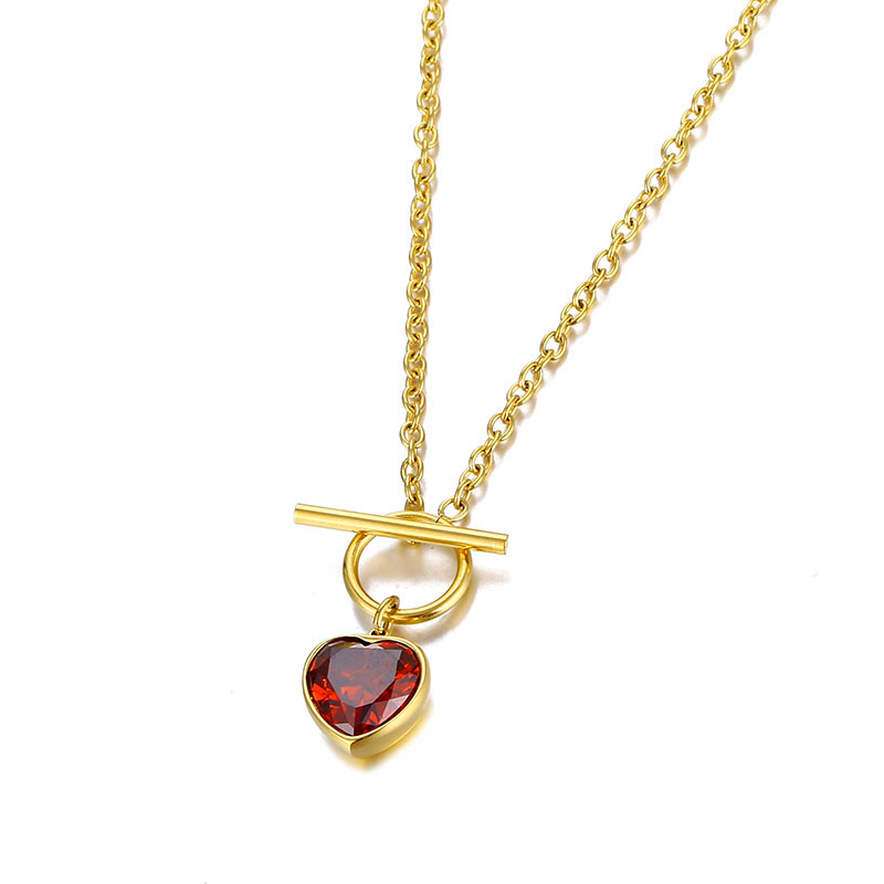 18k gold plated necklace with a red heart shaped cubic zirconia charm.