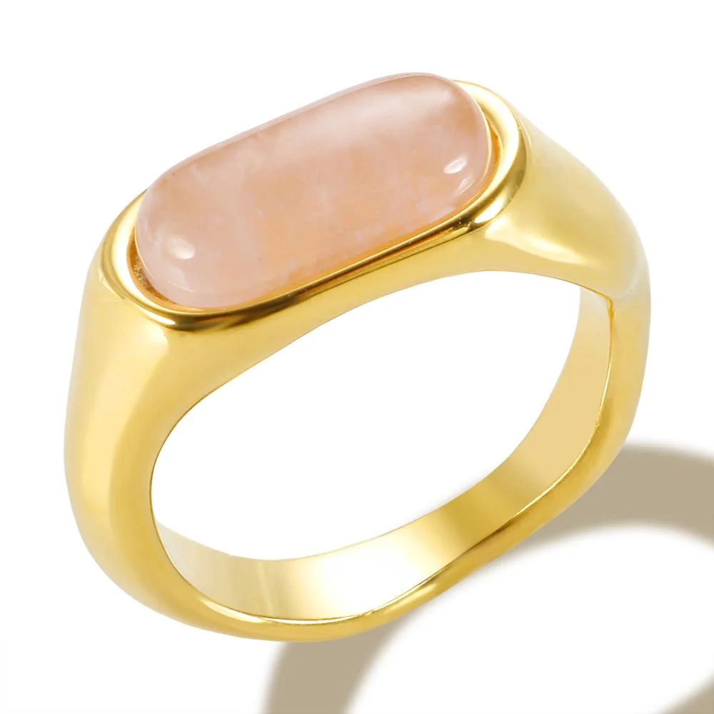 18k gold plated polished gold ring with a light pink gemstone.