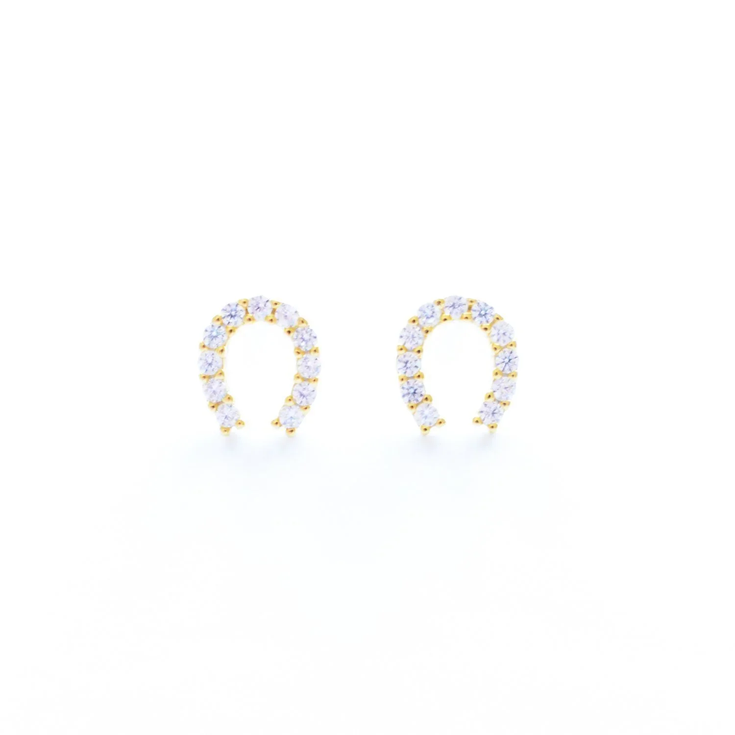 Lexi CZ Horseshoe Stud Earrings featuring a delicate horseshoe design with sparkling cubic zirconia stones and a polished gold finish.