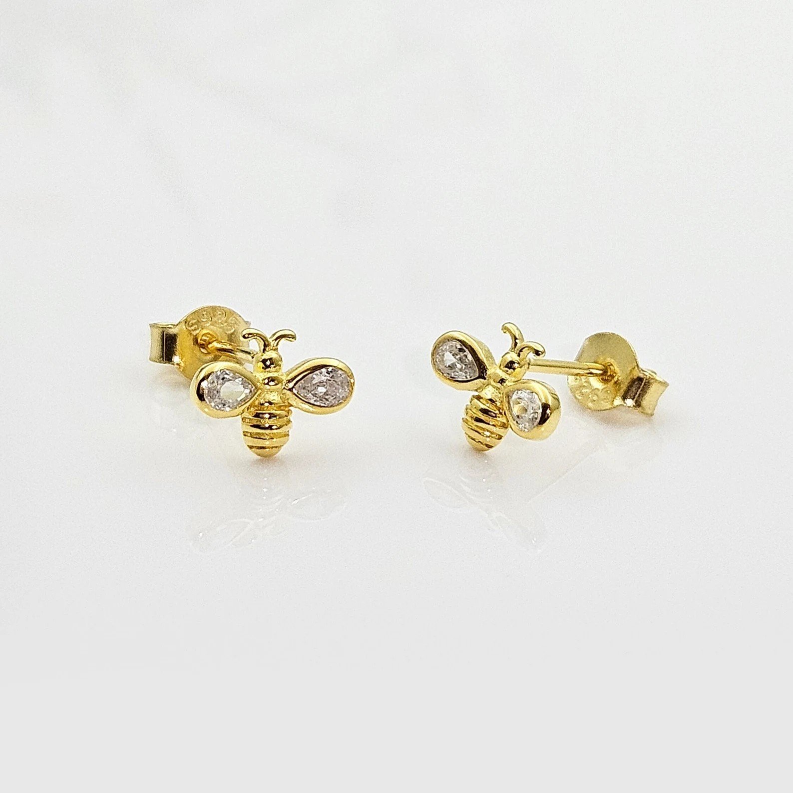 18k gold plated sparkly cubic zirconia earrings that are lightweight, high quality, and hypoallergenic.