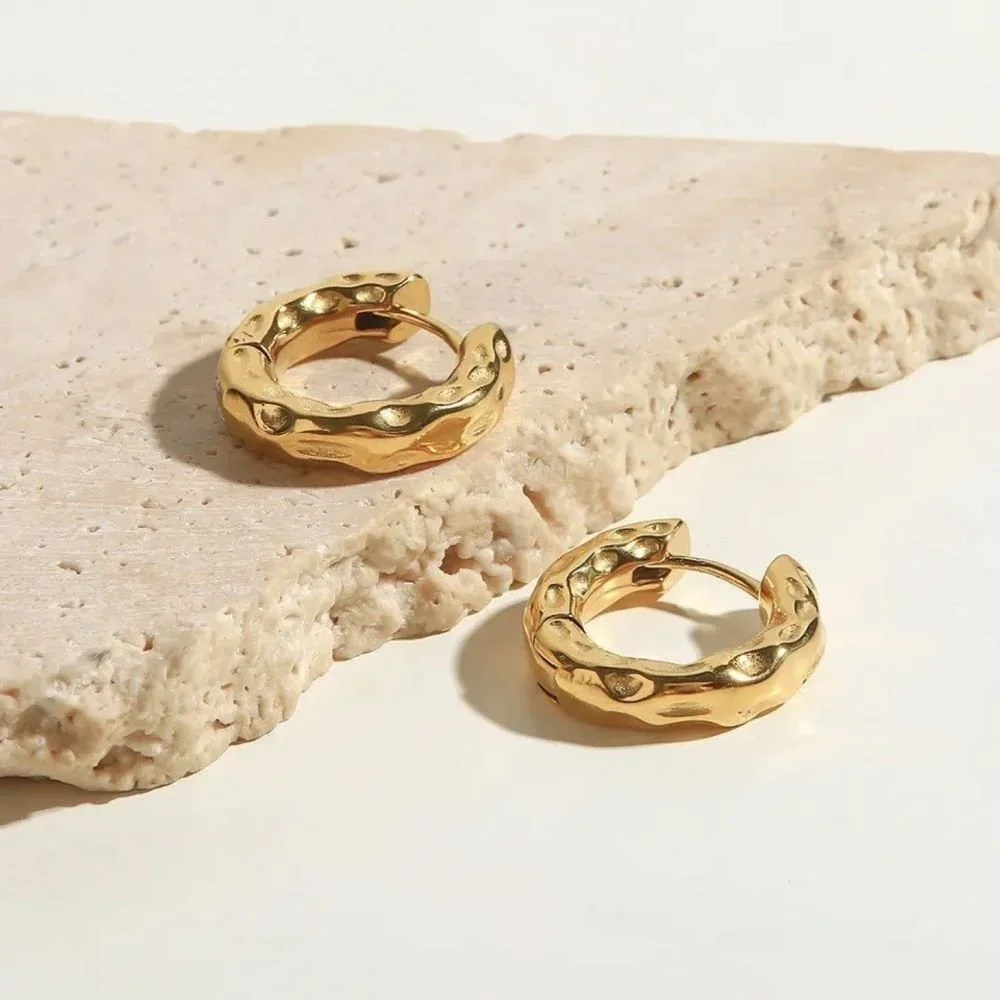 Gold Hammered Hoop Earrings showcasing a chic and versatile gold jewelry look perfect for everyday wear or special occasions.