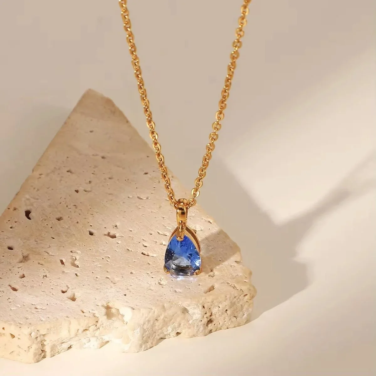 Blue gemstone gold pendant necklace for women, a timeless jewelry gift perfect for birthdays, anniversaries, vacations, and special occasions.