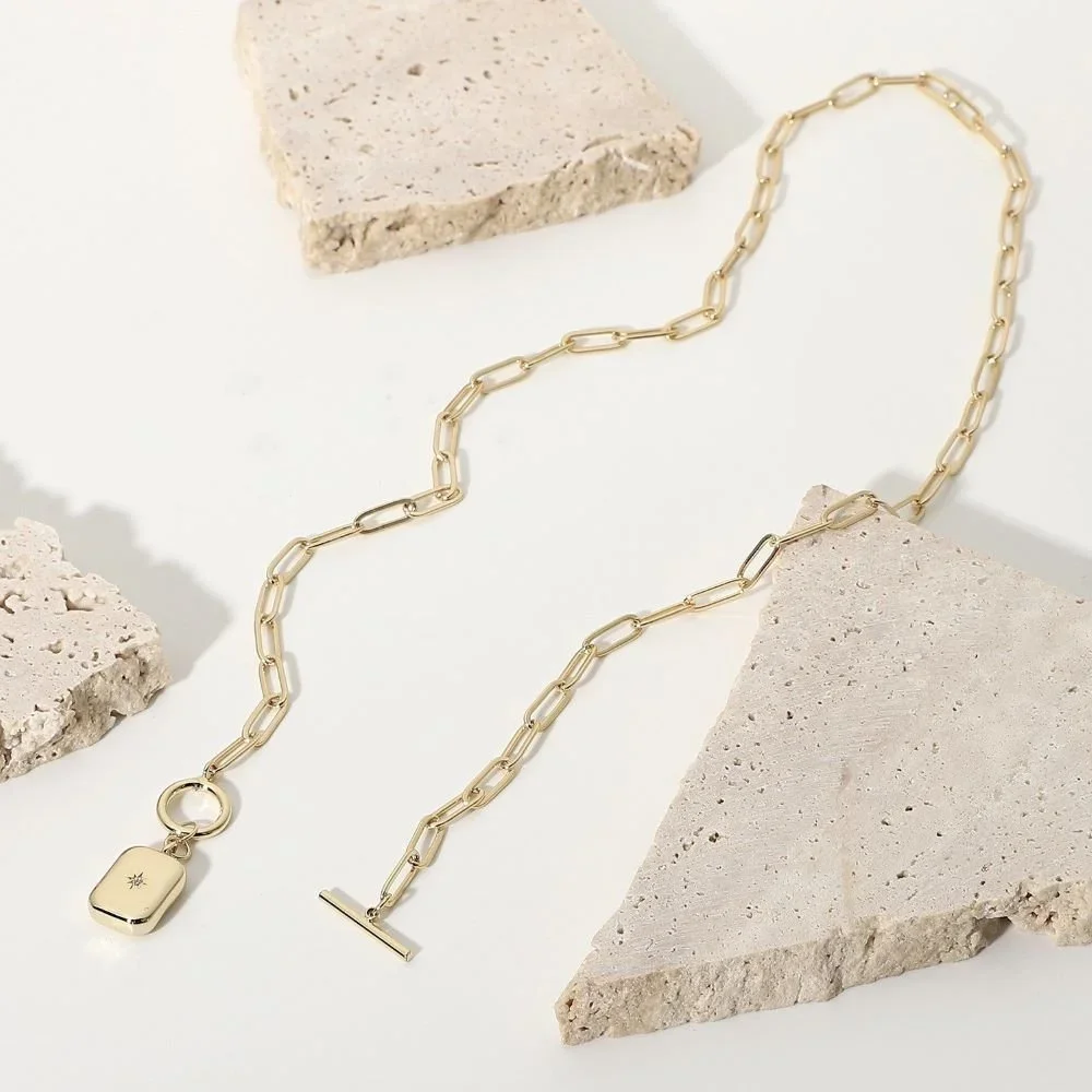 Gold Sunburst Toggle Necklace for women, a unique statement jewelry piece and thoughtful gift perfect for birthdays, vacations, anniversaries, and celebrations.