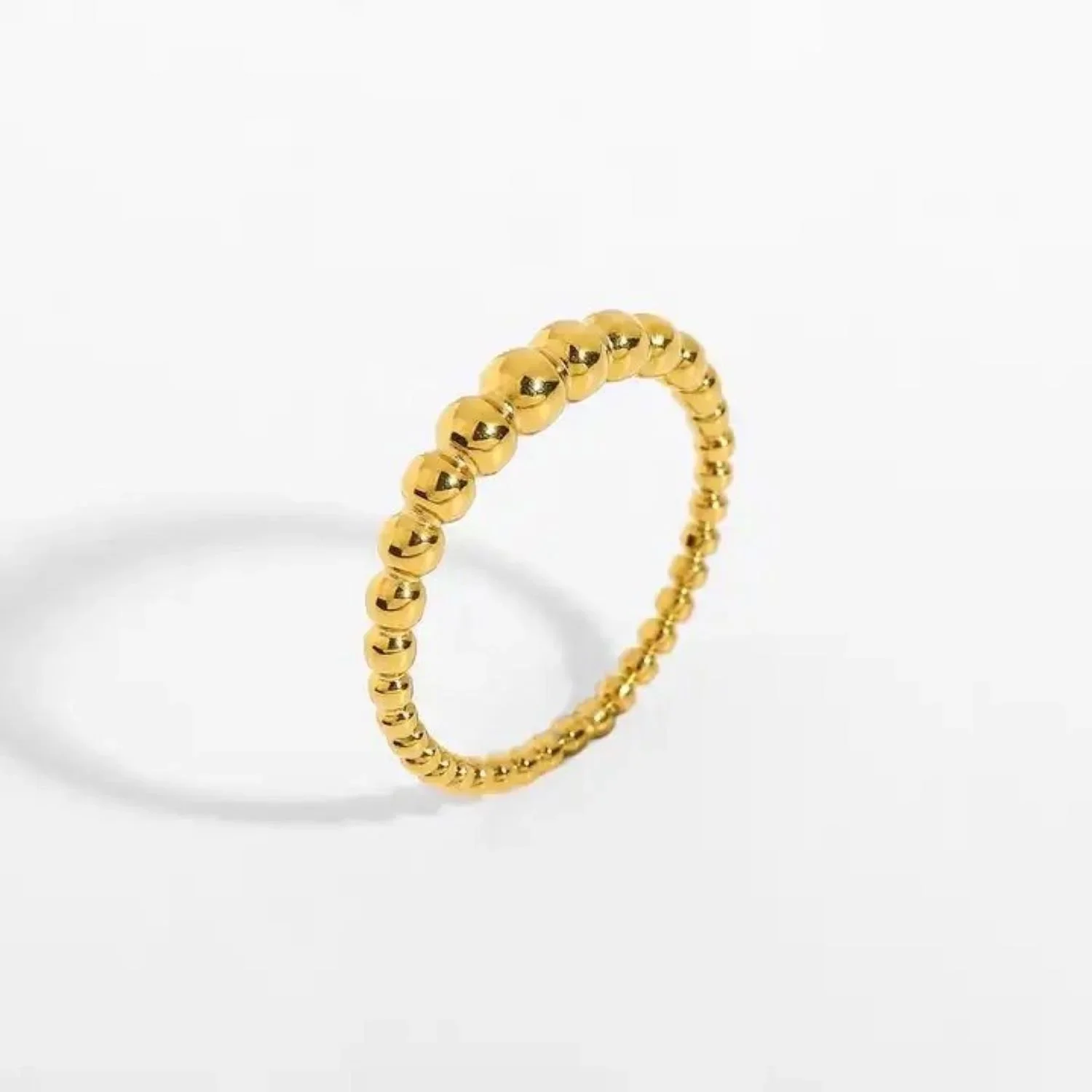 Close-up of Blakes Beaded Gold Ring highlighting the detailed bead texture, smooth gold finish, and handcrafted-inspired design.