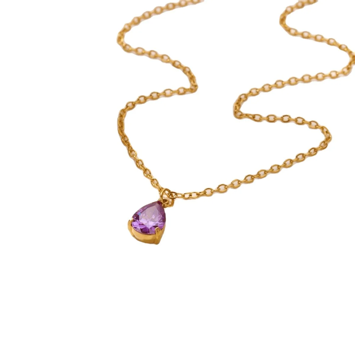 A teardrop shaped amethyst gemstone that hangs from a gold chain with an adjustable clasp closure.
