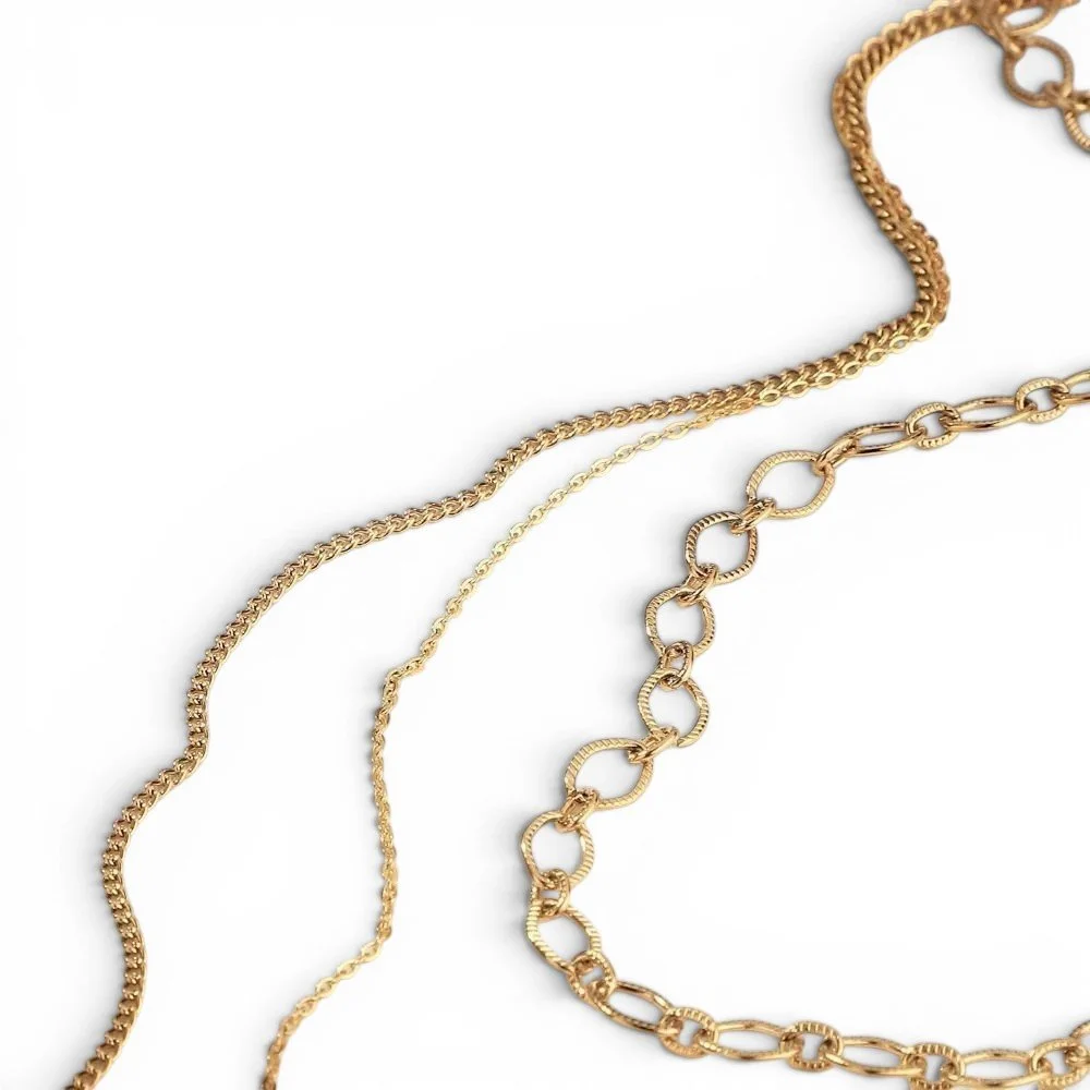 A gold statement layering necklace for everyday wear.
