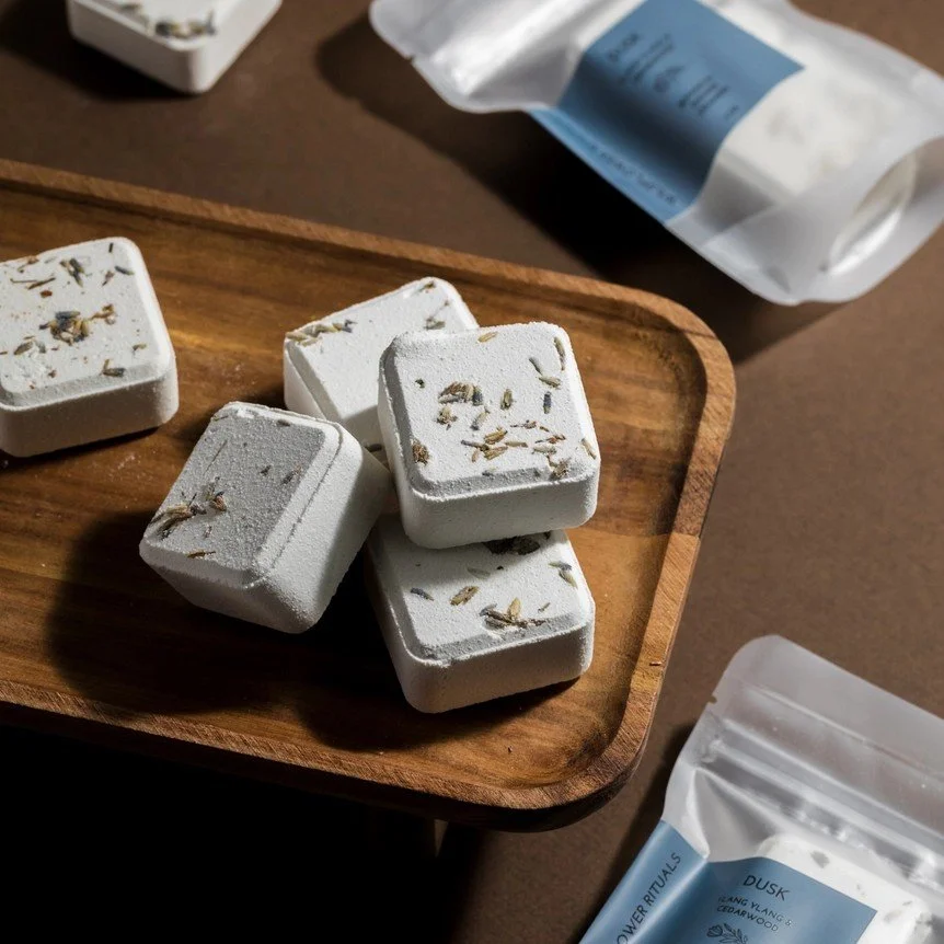 Ylang ylang and cedarwood scented aromatherapy tablets for shower routine.