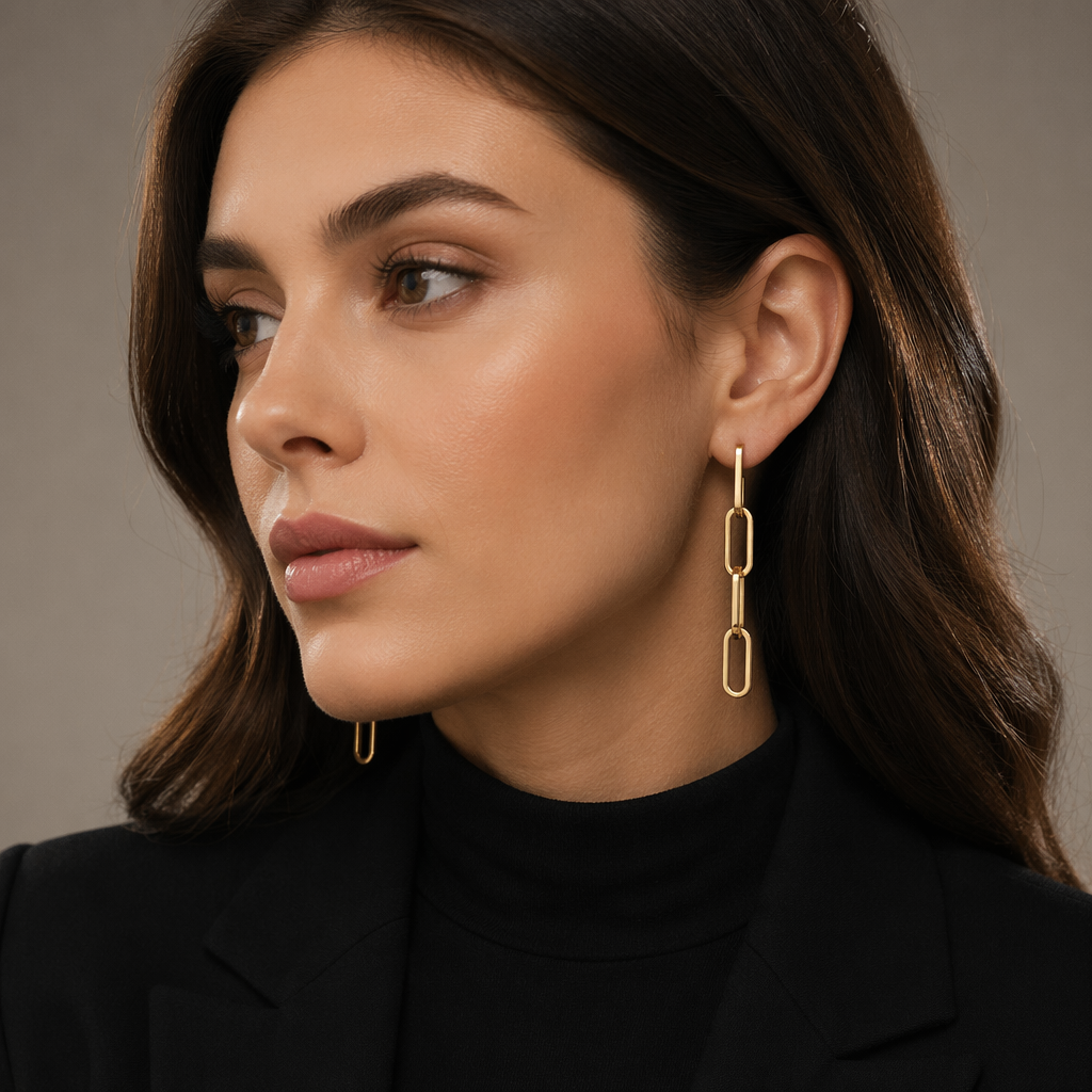 Gold chain link earrings styled for everyday wear.