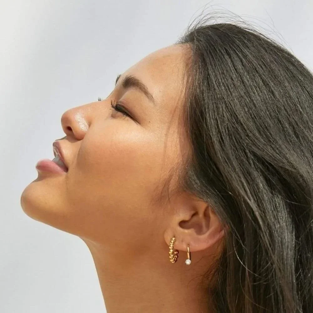 Beaded Circle Hoop Earrings worn on model, showcasing a chic and versatile gold jewelry look perfect for everyday wear.