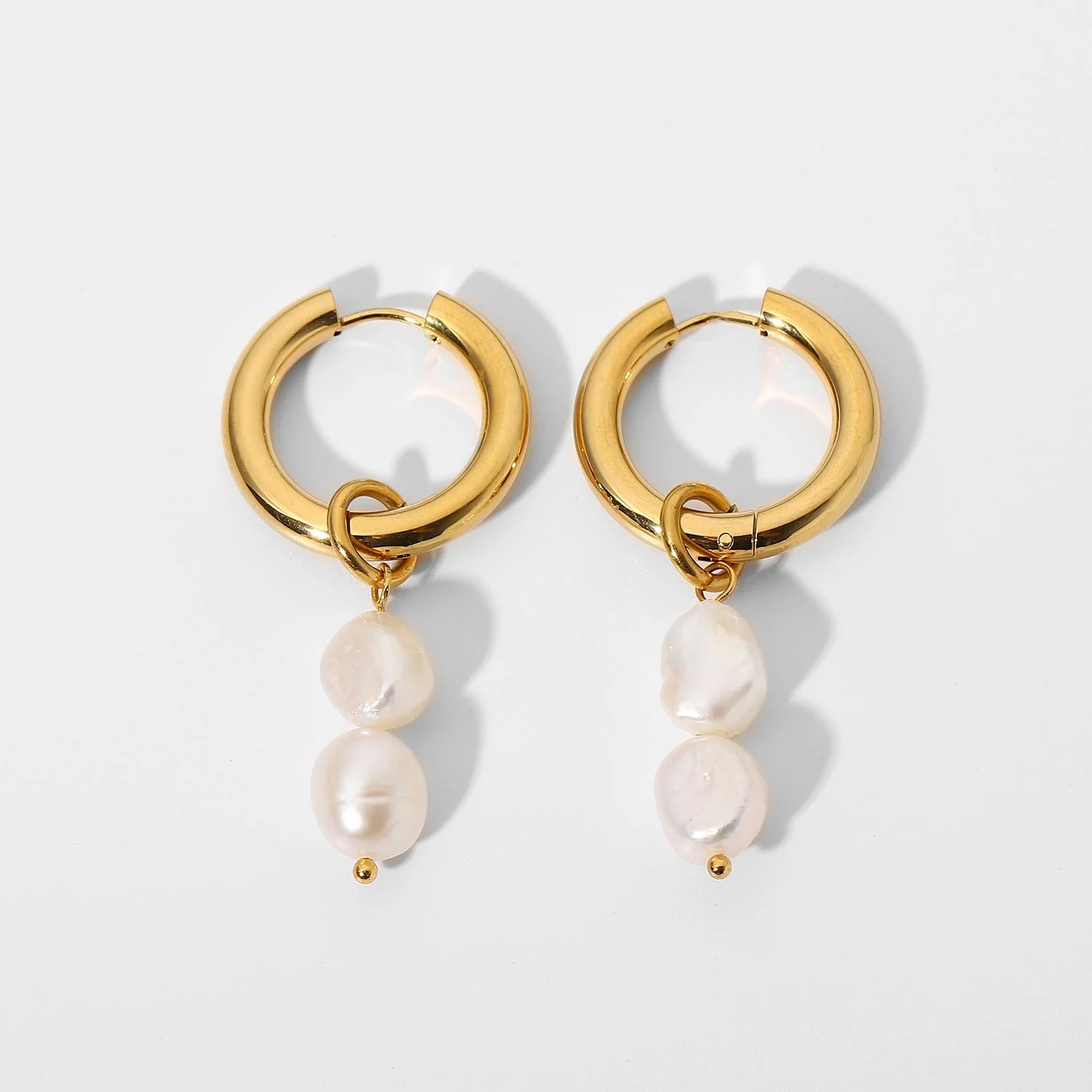 Luminous real pearl hoop earrings for women.