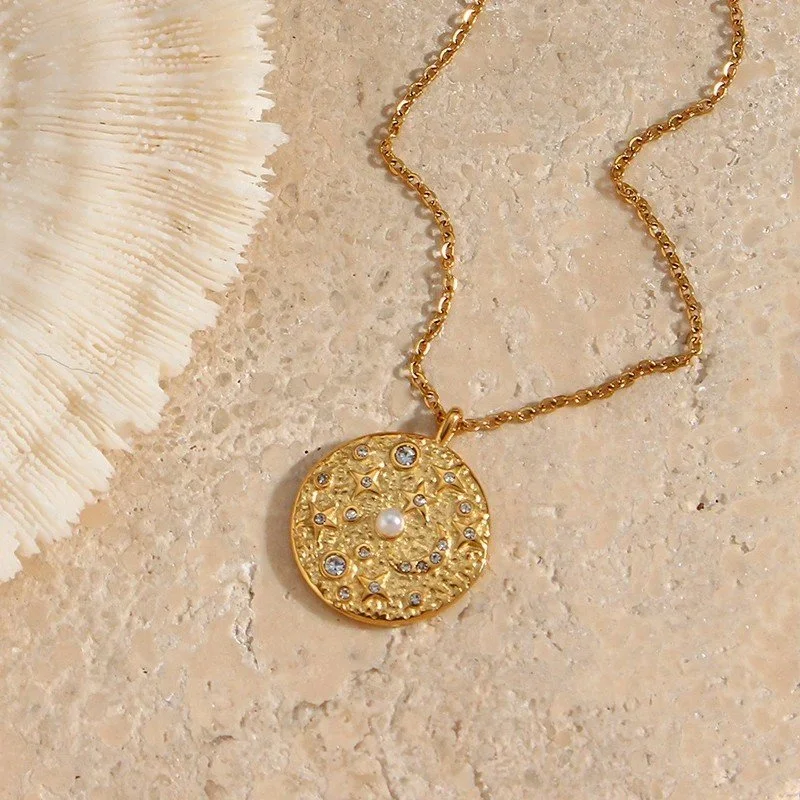 Close-up of Gold Moon & Star Constellation Pendant Necklace highlighting the detailed moon and star pendant, gold finish, and delicate chain craftsmanship.