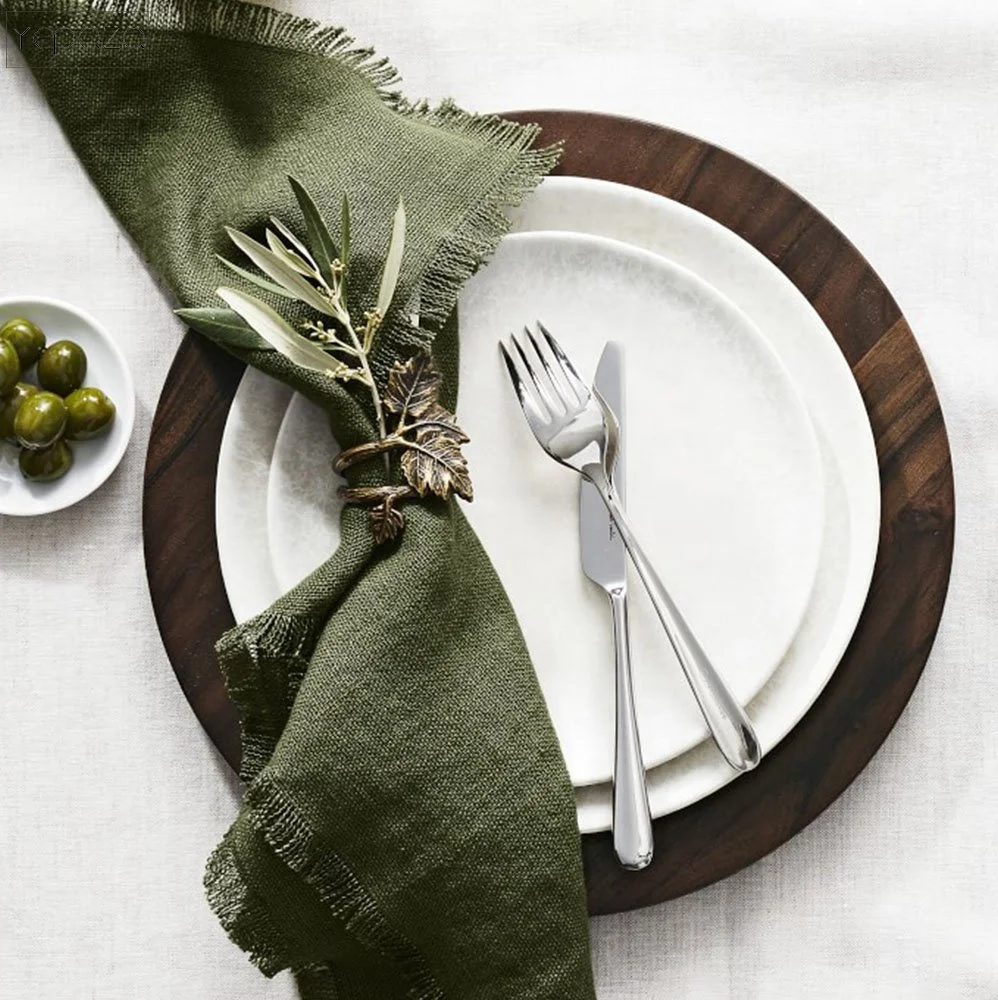 Set of four soft and washable forest green dinner napkins for every occasion.