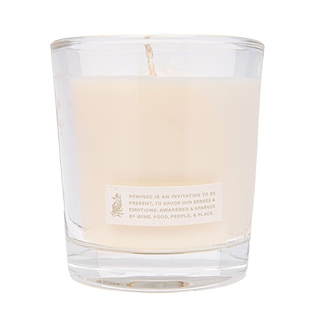 6 oz champagne scented soy candle with elegant floral and citrus fragrance notes.