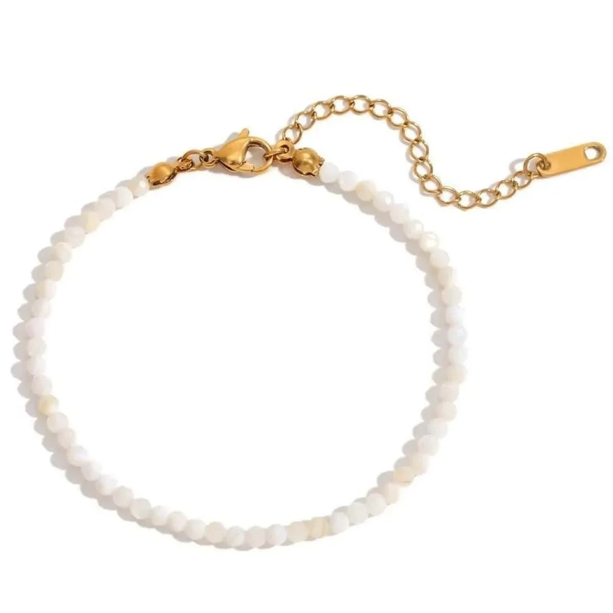 White Jade Beaded Gold Bracelet featuring smooth white jade beads with a polished gold accent design, creating an elegant and timeless everyday jewelry look.