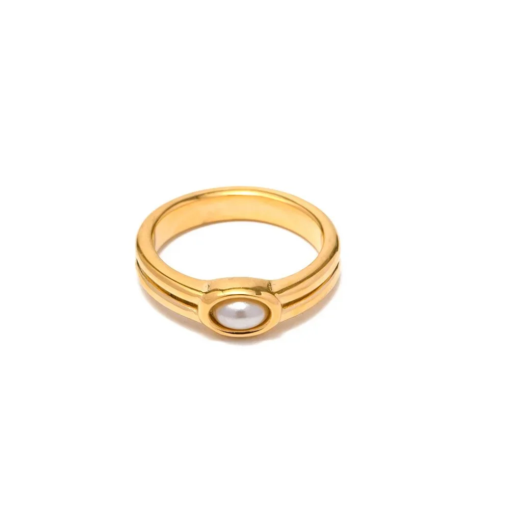 Alexandra Stackable Gold Freshwater Pearl Ring featuring a lustrous pearl centerpiece with a polished gold band and elegant minimalist design.