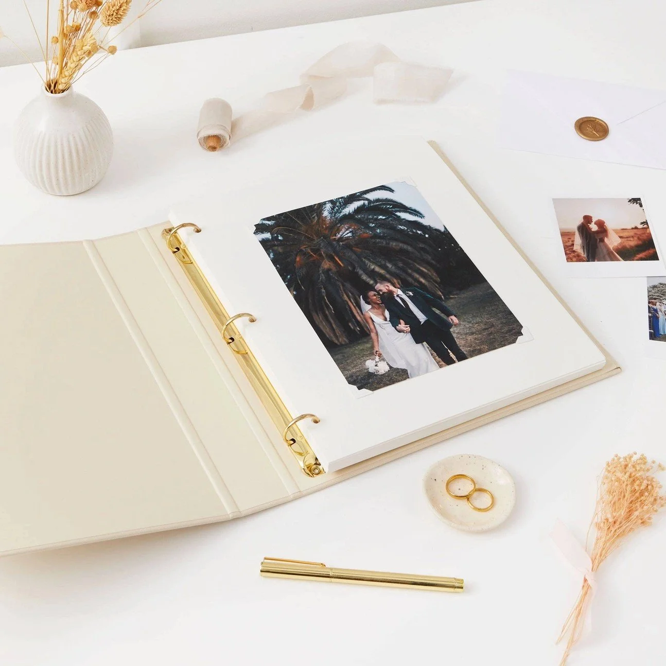 Modern luxury wedding photo album in ivory linen with custom keepsake design for couples.