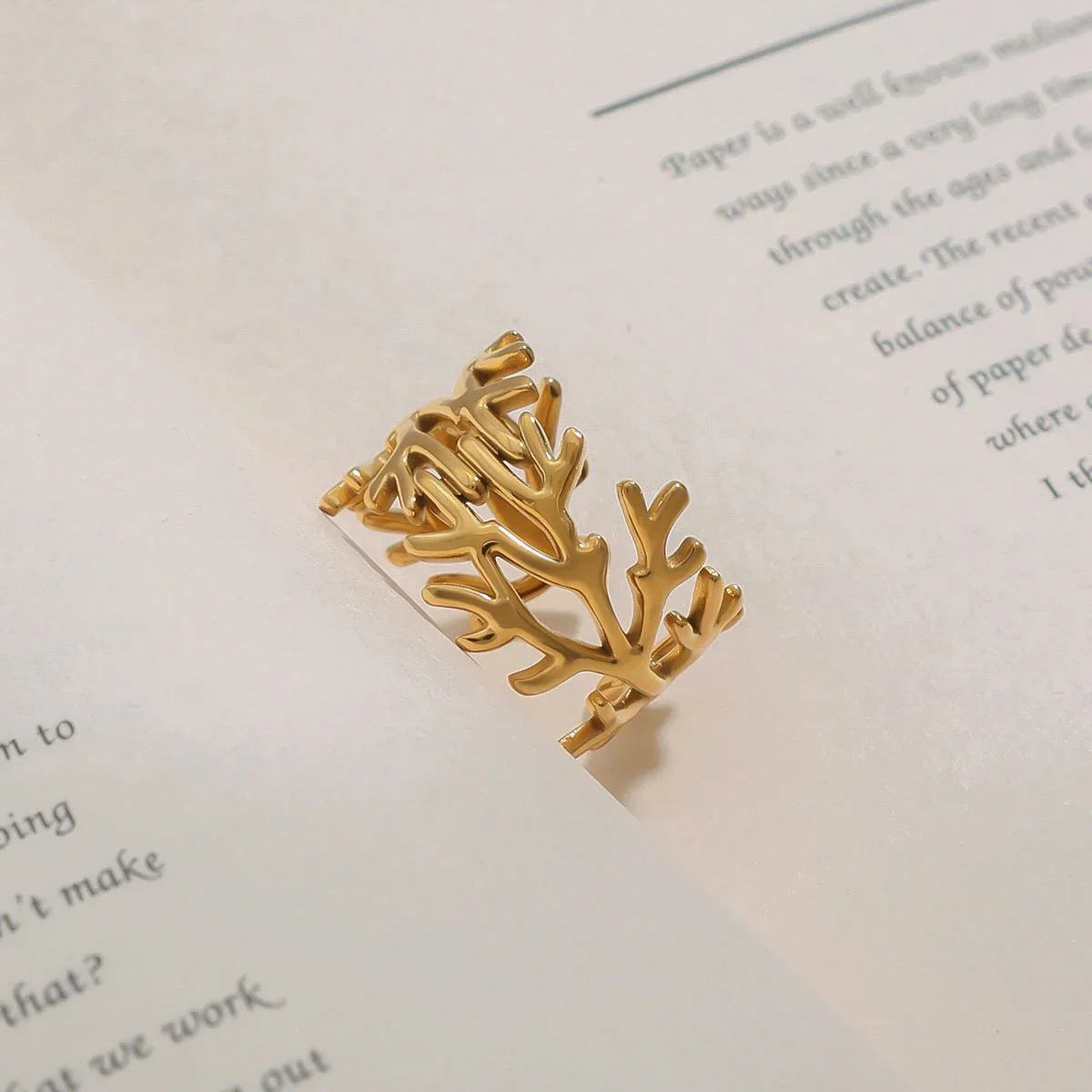 Close-up of Coral Reef Adjustable Gold Ring highlighting the detailed coral-inspired texture, gold finish, and adjustable band design.