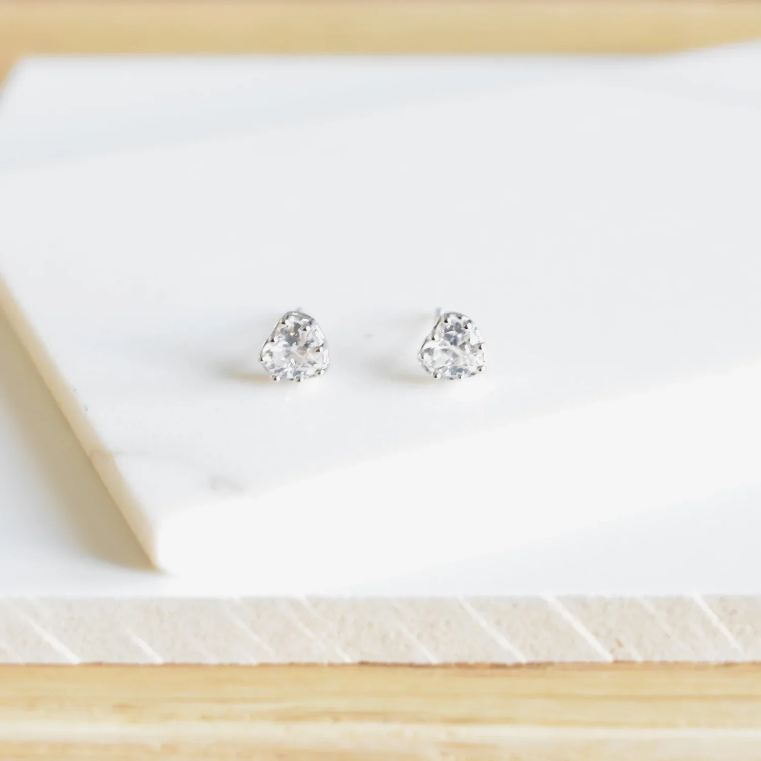 True Love CZ Stud Earrings worn on model, showcasing a timeless and feminine everyday gold and silver jewelry style perfect for any occasion.