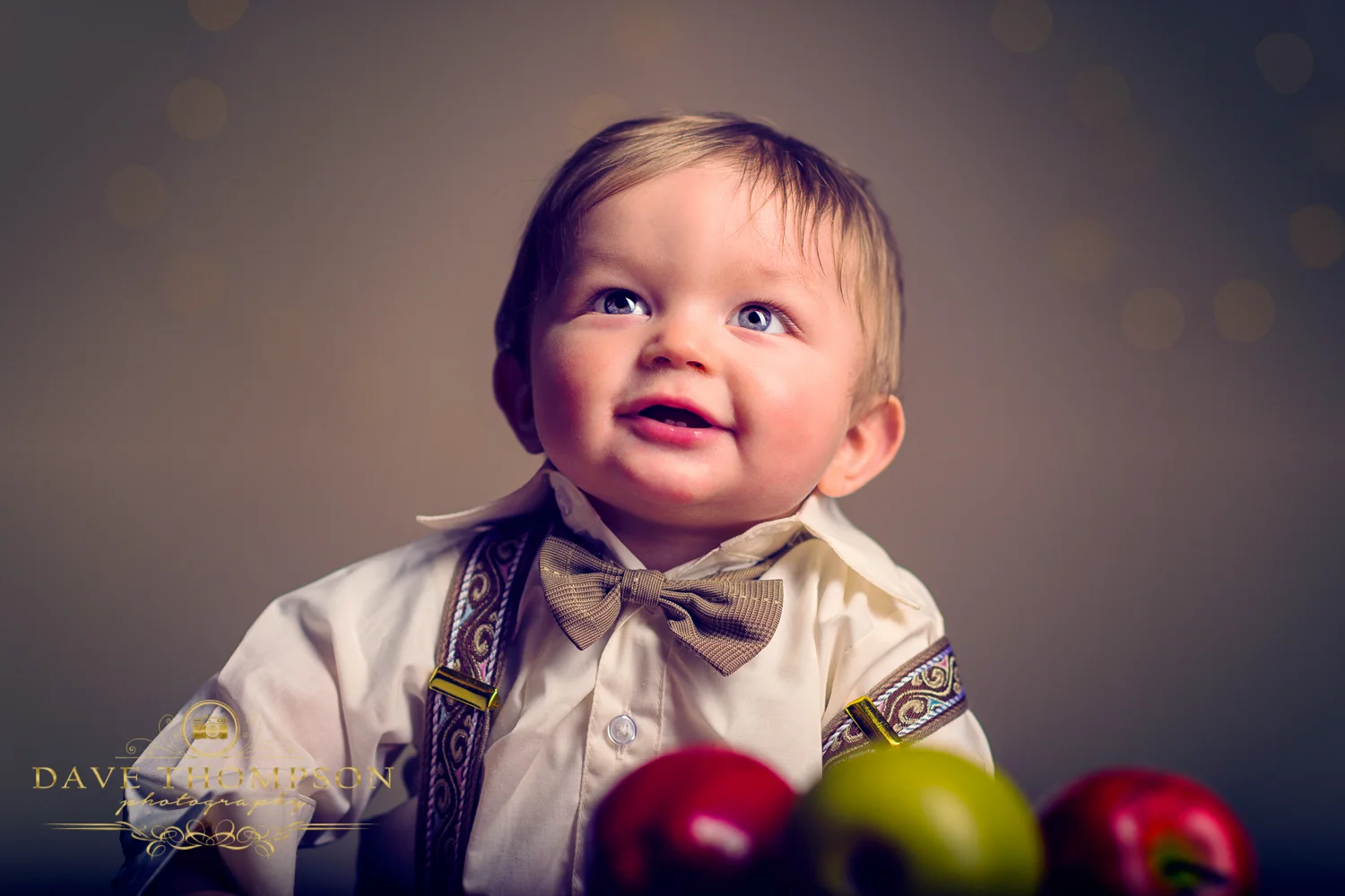 Awww....such an innocent little face. The cheeks are so full of rosy goodness! Doing family portraits in the studio with toddlers and newborns are so much fun!