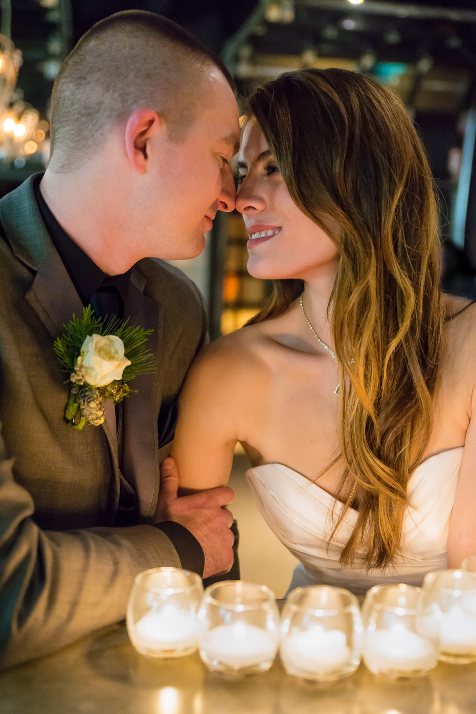 Bride & Groom Kissing in Candle Light